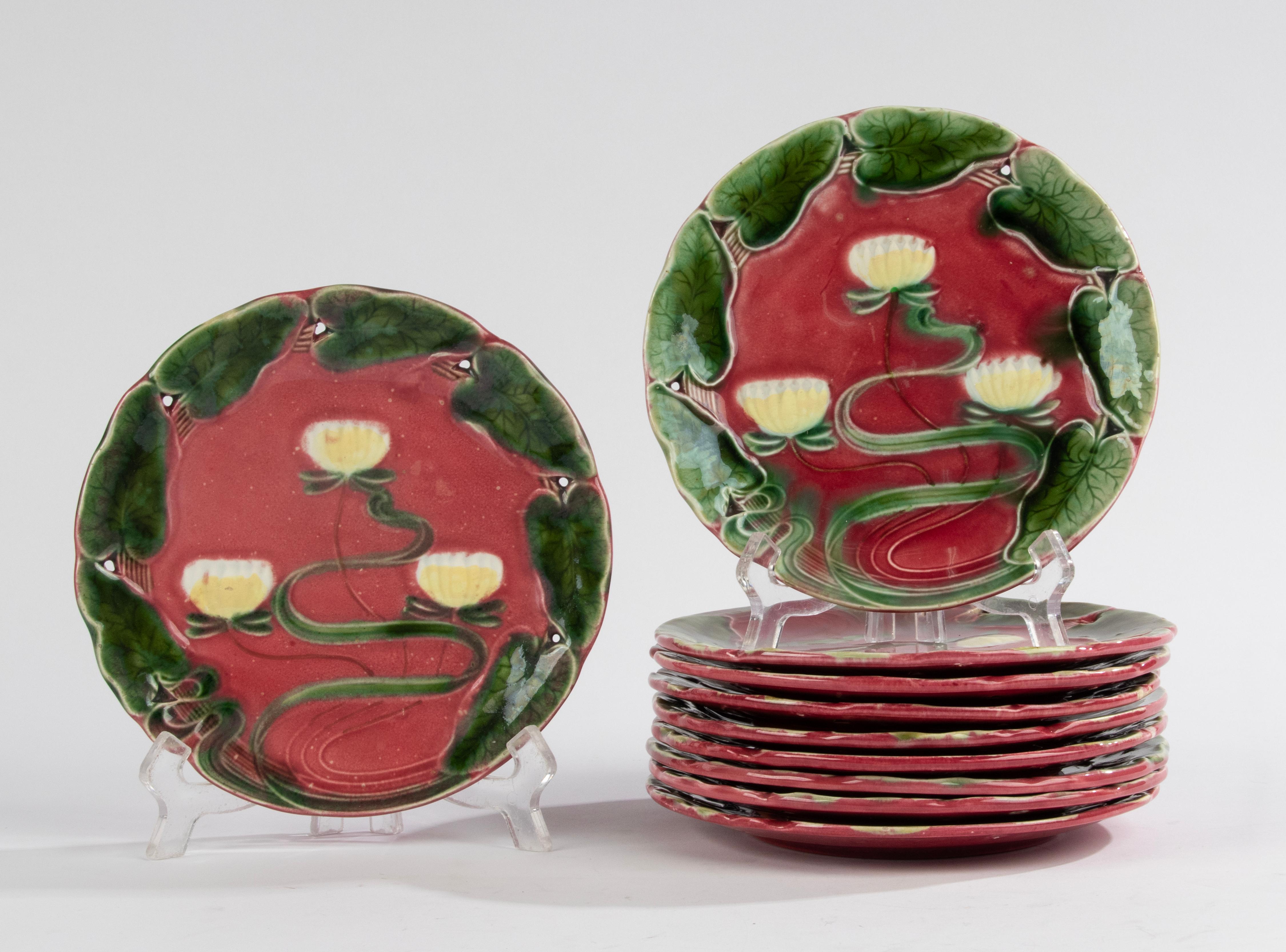 A lovely set of 10 Art Nouveau majolica plates, made by Villeroy & Boch. Colorful pattern with water lilies. 
The plates date from circa 1900. 
They are in good condition, no chips and no hairlines. 
Beautiful color and glaze. 

The plates are Ø17