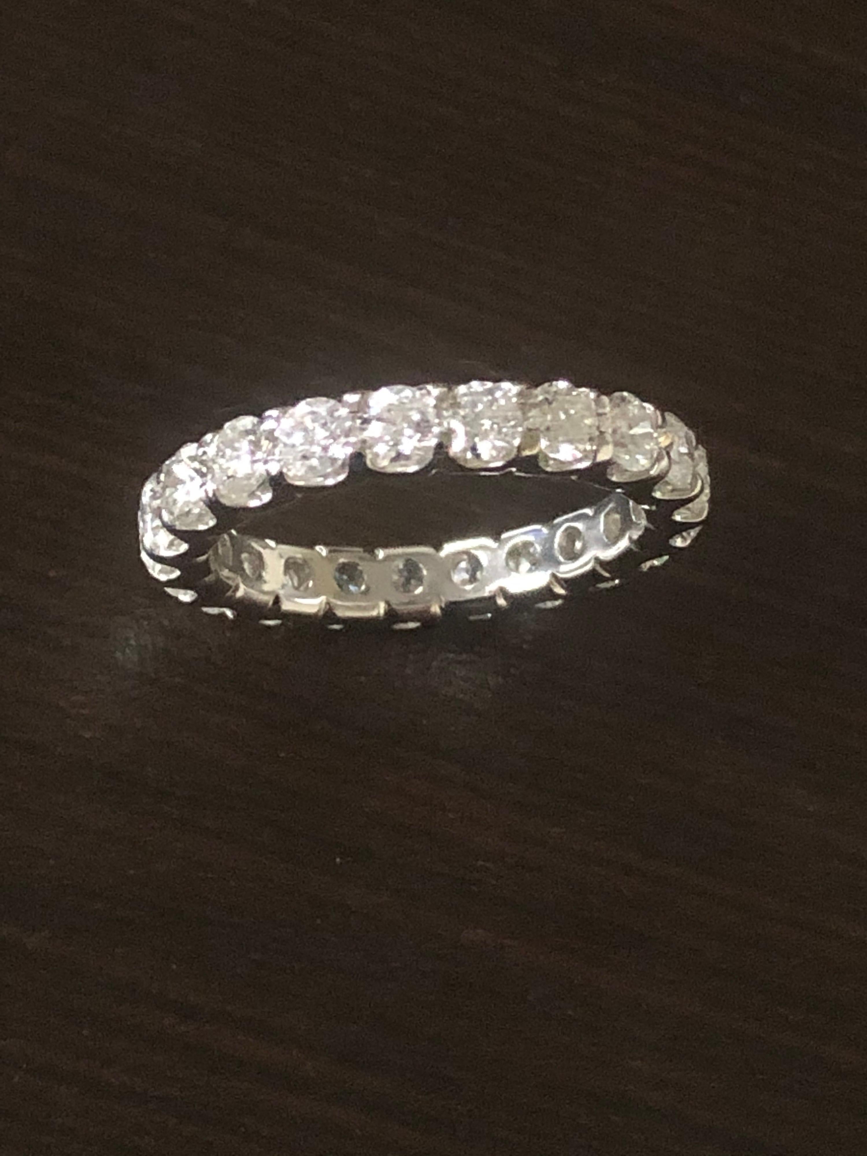 2 carat 3 carat eternity band on finger