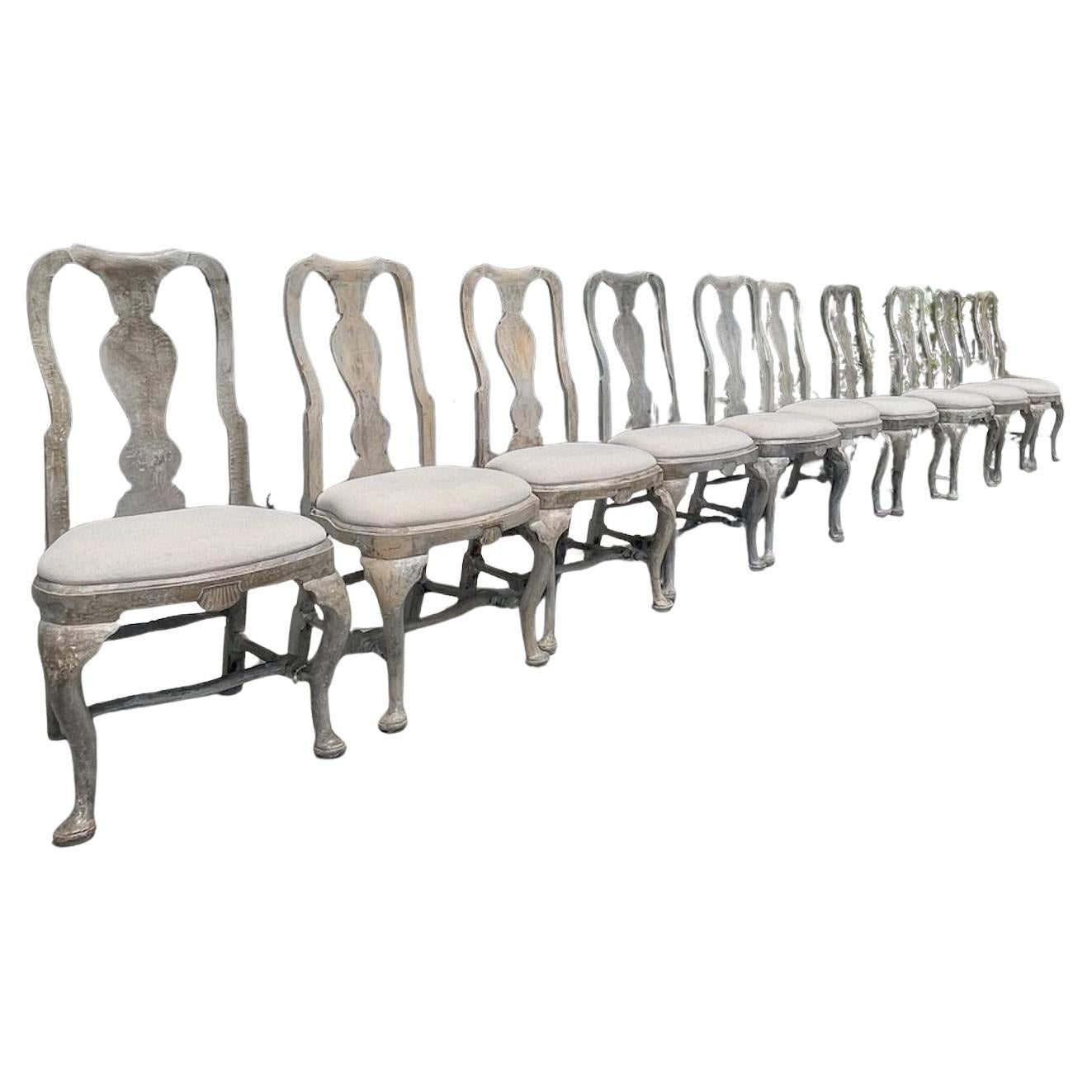 10 Reproduction French Louis XVI Hand Carved Dining Chairs with Fabric Cushions In Distressed Condition In Santa Monica, CA