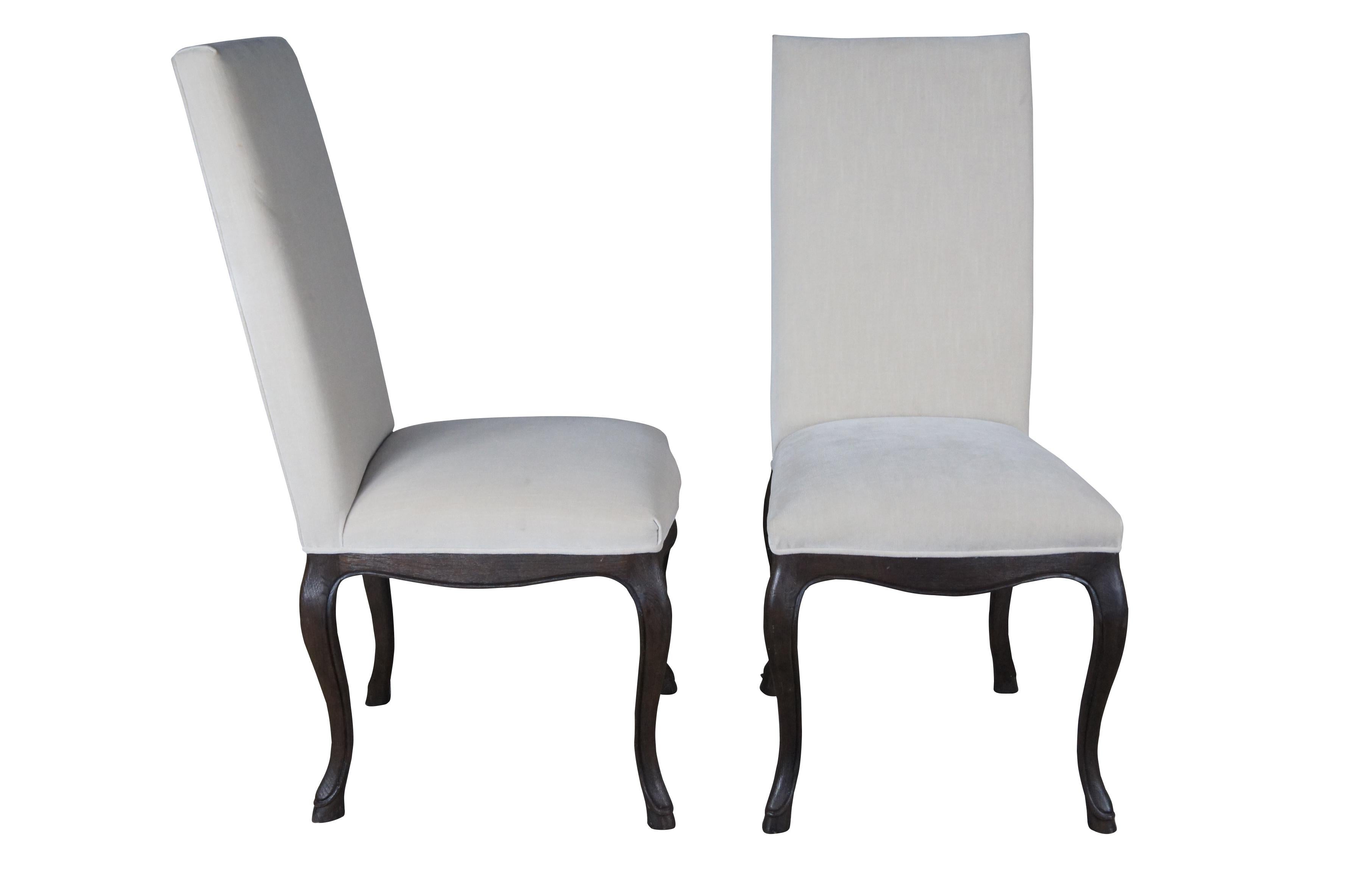 Ten Restoration Hardware French Louis XVI style dining chairs. Features a square back with velour / velvet upholstery and serpentine cabriole legs with hoof foot. 

