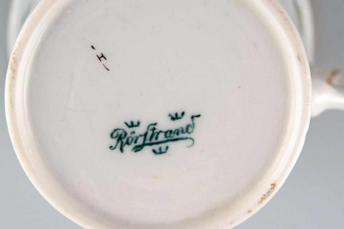 20ième siècle 10 tasses à café Rörstrand avec soucoupes en porcelaine peinte à la main. en vente