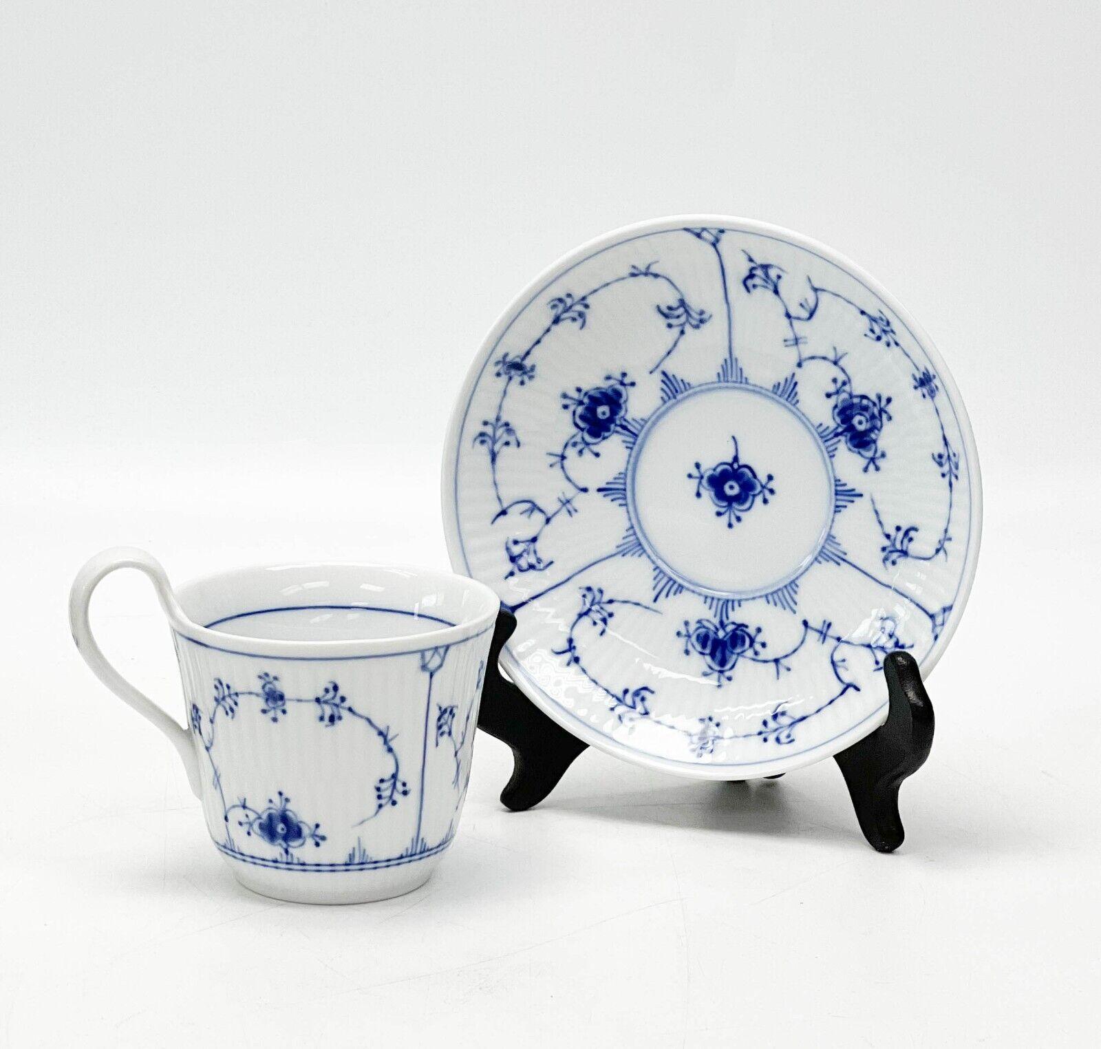  0 Royal Copenhagen Denmark blue fluted porcelain cups & saucers #093 / #094. Fluted porcelain with a delicate blue floral design. Royal Copenhagen marks to the underside

Additional Information: 
Type: Cup and Saucers
Composition: Porcelain
Weight