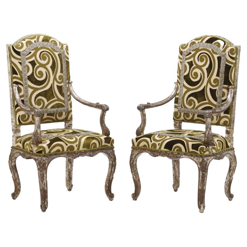 10 silver leaf open armchairs having hand carved frames. Priced Individually.  For Sale