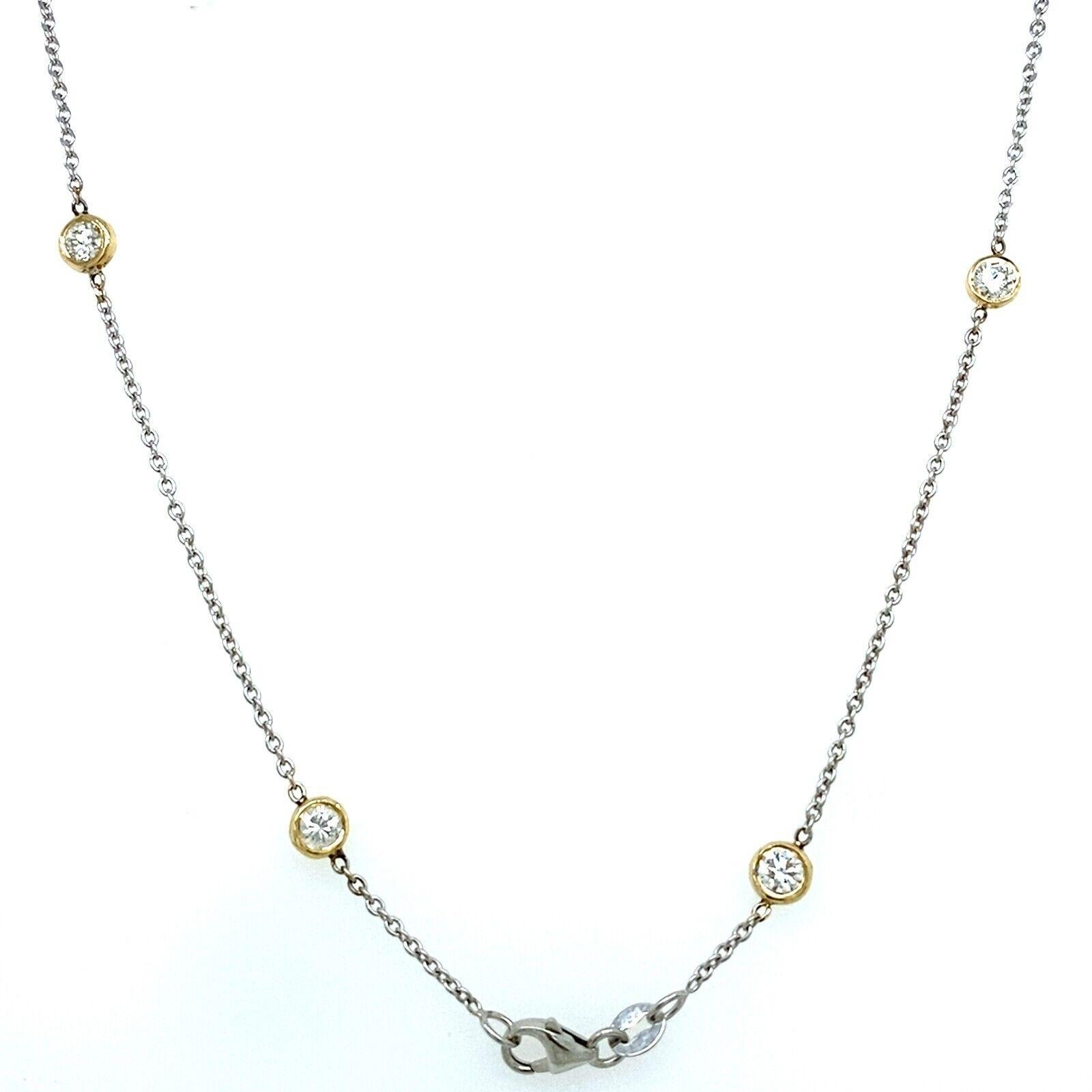 A timeless piece, this 10-stone rubover necklace set in 14ct White Gold chain and 18ct Yellow Gold rubover settings is a classic design with a modern twist. A total of 1.60ct G/H SI Diamonds are set in a 10-stone rubover setting. This necklace is