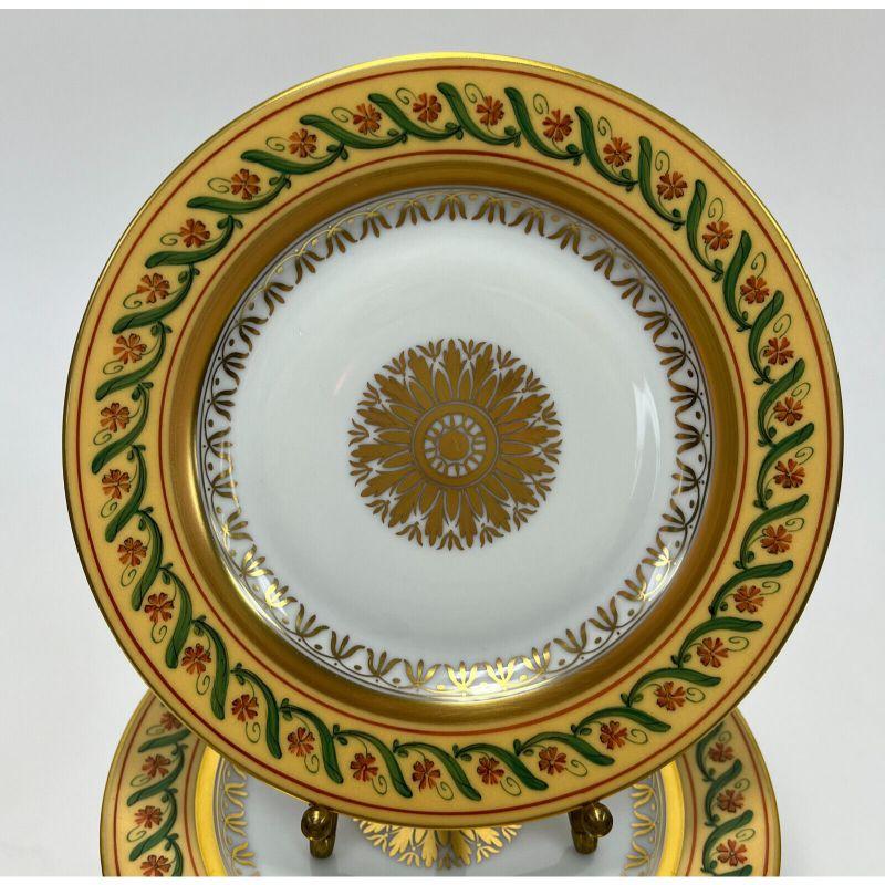 10 Tiffany & Co. Le Tallec Private Stock Porcelain Bread & Butter Plates in Directoir

A yellow ground with hand painted flowers and leaves throughout. Gilt florals to the center. Tiffany & Co. Private stock marks to the underside. With original