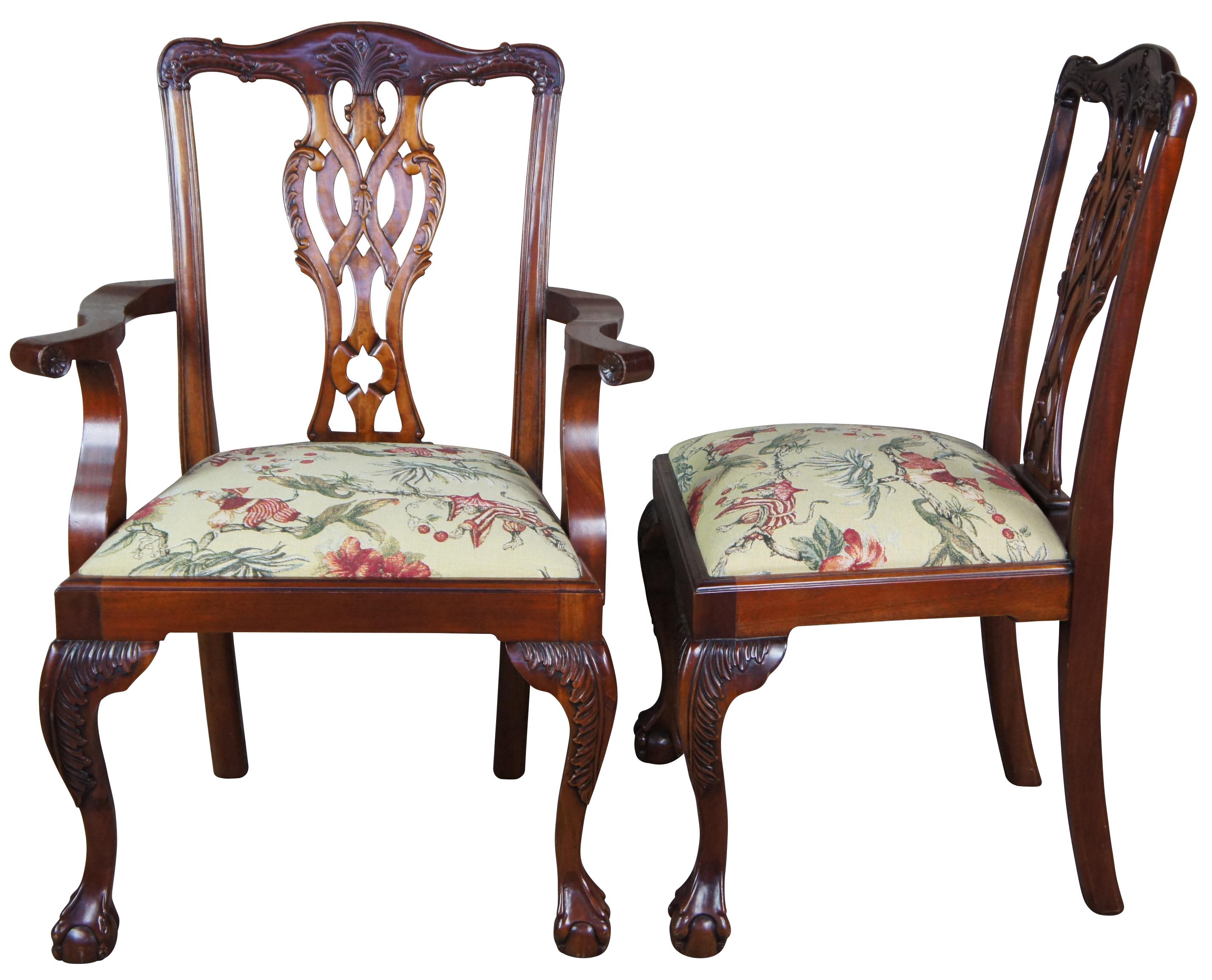 Set of ten Chippendale dining chairs. Made of mahogany featuring serpentine form with a woven pretzel style back, acanthus carvings, and New York ball and claw feet. Upholstered seat featuring tapestry scene with climbing monkeys in asian hats