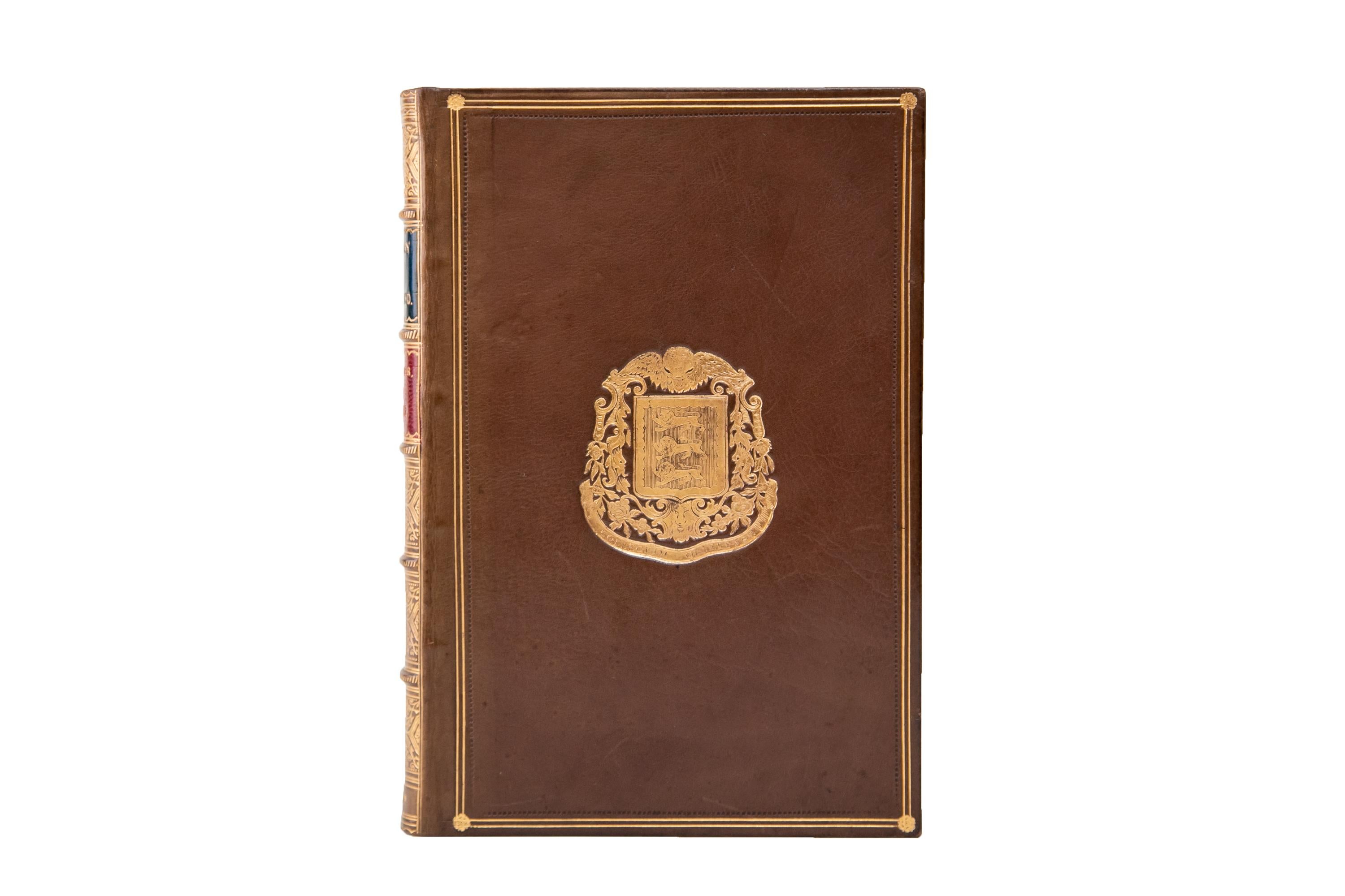10 Volumes. Samuel R. Gardiner, History of England. Bound in full brown calf with the covers displaying borders, floral corner flourishes, and a central crest, all gilt-tooled. The spines display red and blue morocco labels with raised bands, ornate