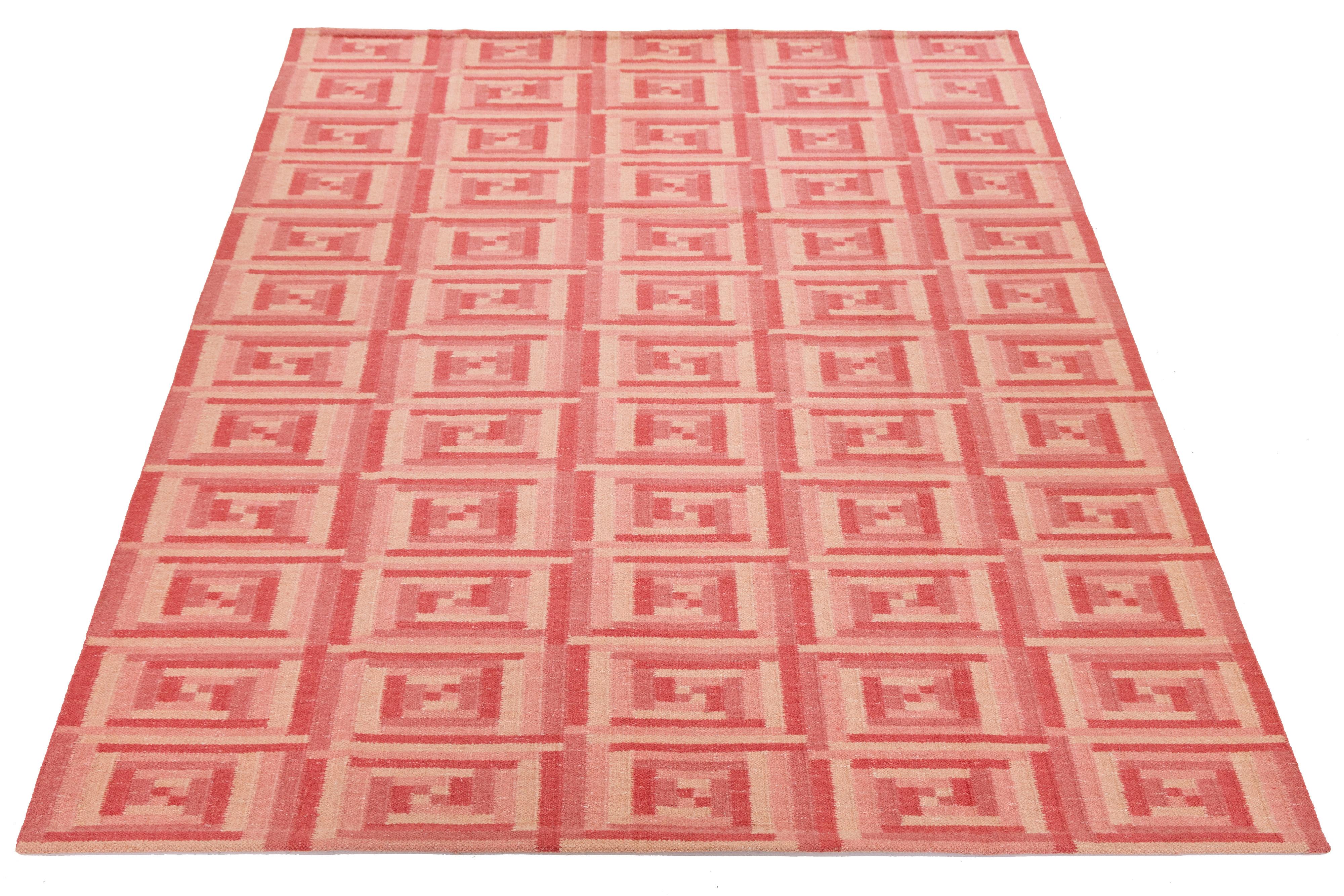 This 10' x 14' Contemporary Scandinavian Style Wool Rug is a beautifully crafted piece that blends modern minimalism with Nordic warmth. Made from 100% wool, it offers a naturally soft, durable surface that’s perfect for high-traffic areas while