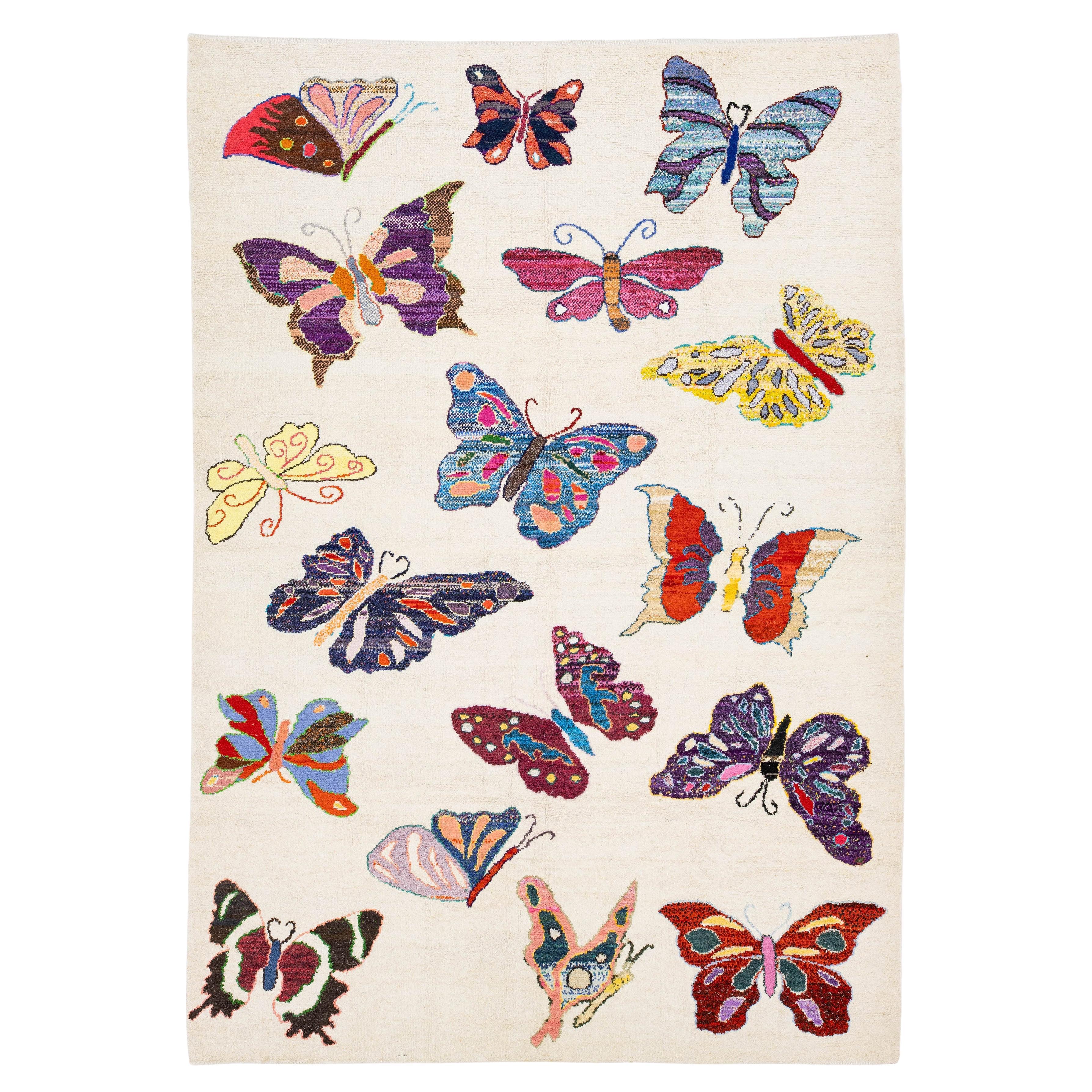 10 x 14 Moderner türkischer handgeknüpfter Wollteppich - Buntes Schmetterlingsmotiv im Angebot