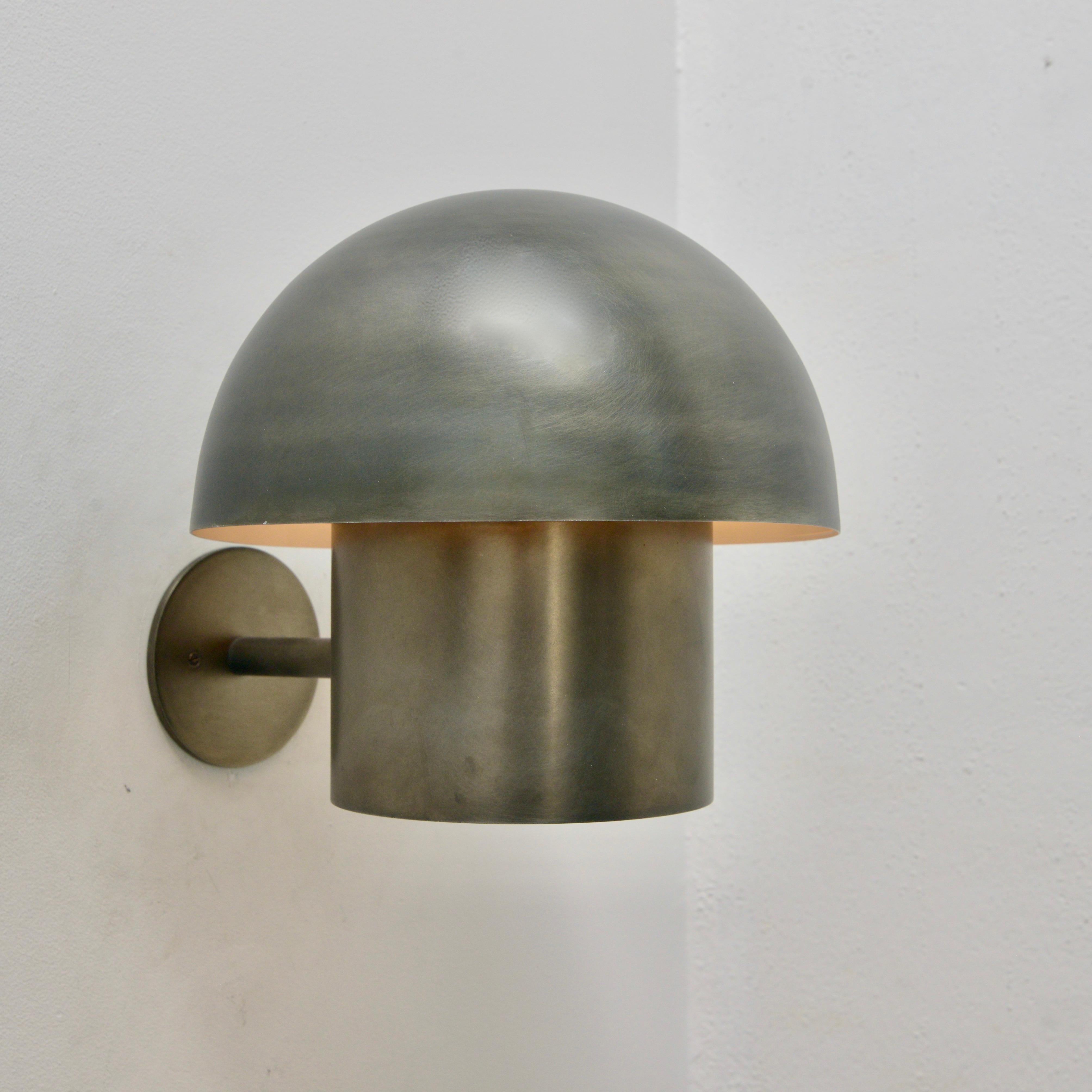 Handsome Zinc Outdoor Sconce in a Classic Mid-Century Modern Scandinavian design. Crafted from zinc plated steel, clear sealed. Wired with a single E26 medium based socket. Light casts downward. Lightbulbs included with order. Priced individually.