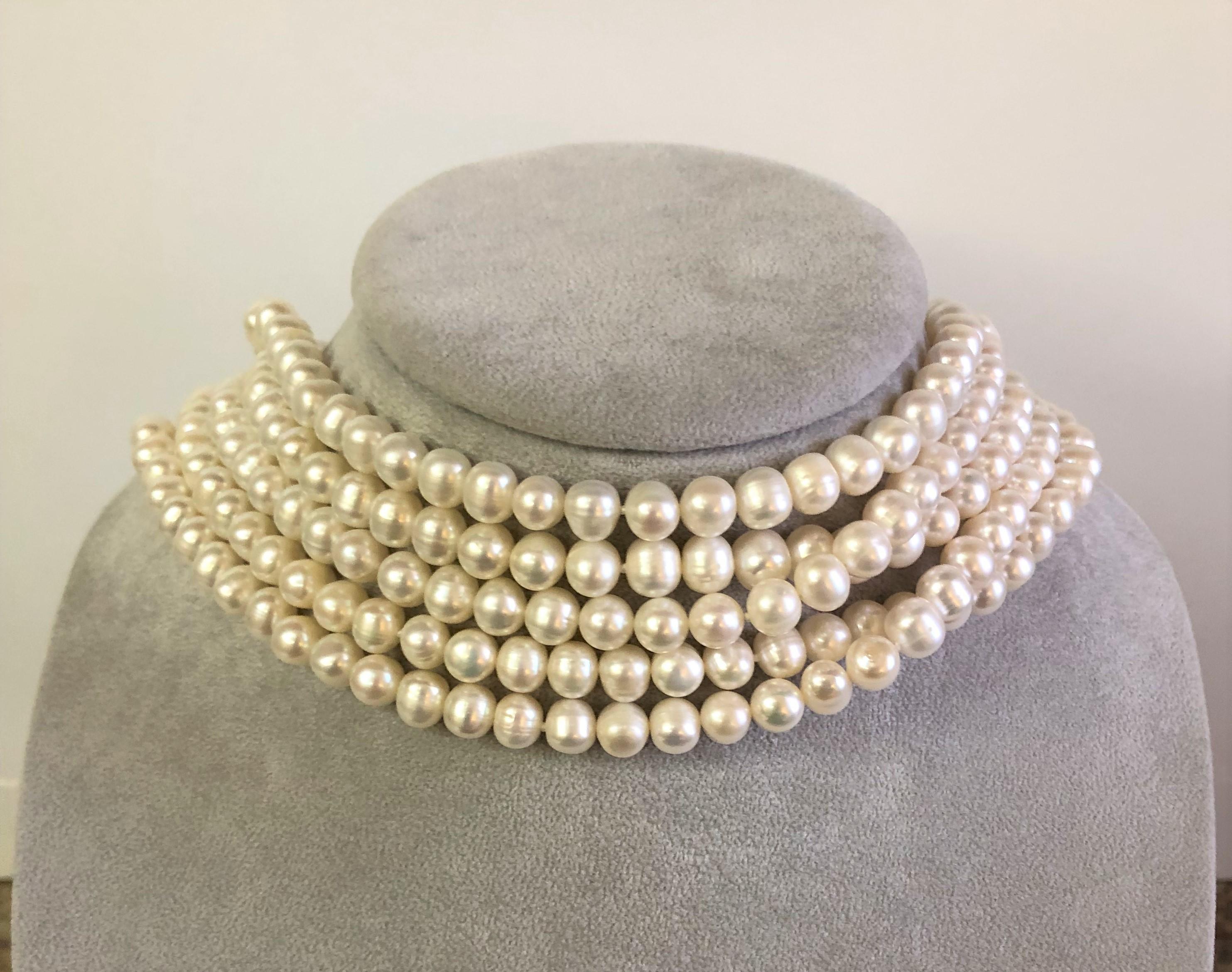 This pearl necklace can be worn so many different ways, very versatile!  
100 inches, no clasp.
Off-round warm white colored pearls with high luster.
Recently restrung.  