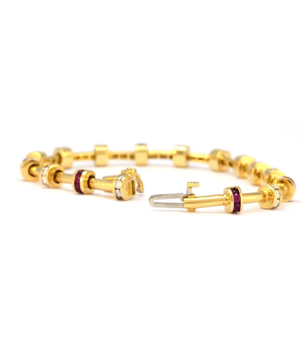 Take a look at this gorgeous 100% Authentic Charles Krypell Solid 18K yellow gold ruby & diamond bracelet in excellent condition! This bracelet is approximately 7.5 inches There are 8 links containing 4 diamonds each, 32 diamonds total. These