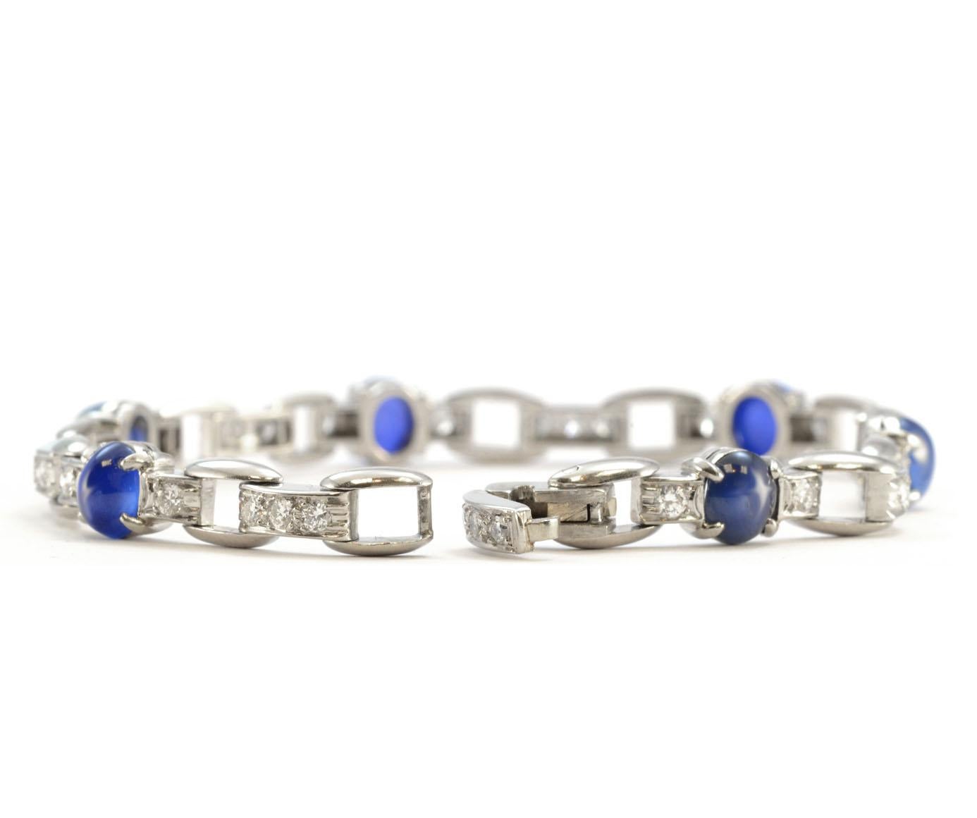 100% Authentic Tiffany & Co. Platinum Genuine Cabochon Sapphire and Diamond Bracelet
Excellent condition! This bracelet is exceptionally beautiful. Crafted in pure platinum, this bracelet features 6 genuine cabochon sapphires, measuring