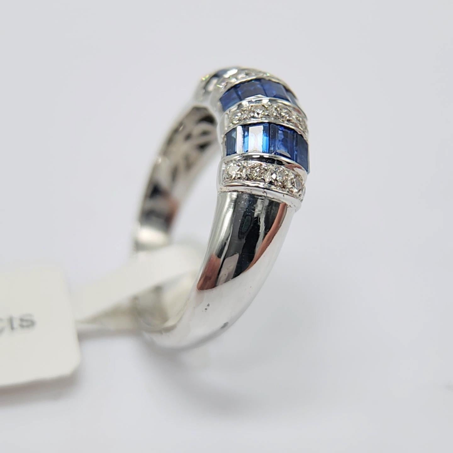 Women's 1.00 Carat Blue sapphire Baguette Ring 14 Karat White Gold with Diamonds.