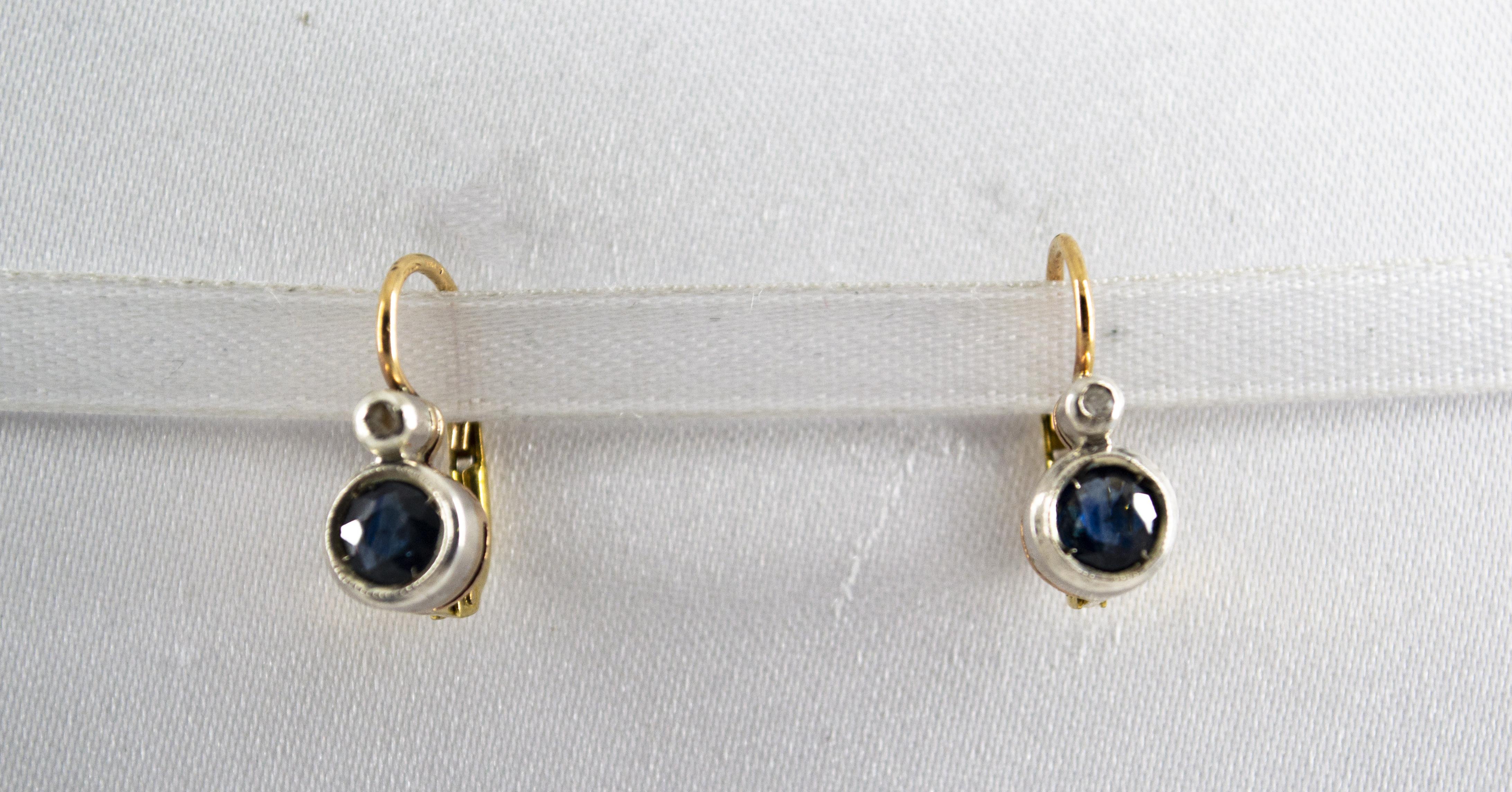 These Lever-Back Earrings are made of 9K Yellow Gold and Sterling Silver.
These Earrings have 0.02 Carats of White Diamonds.
These Earrings have also 1.00 Carat of Blue Sapphires.
These Earrings are available also with Ruby or Emerald.
All our