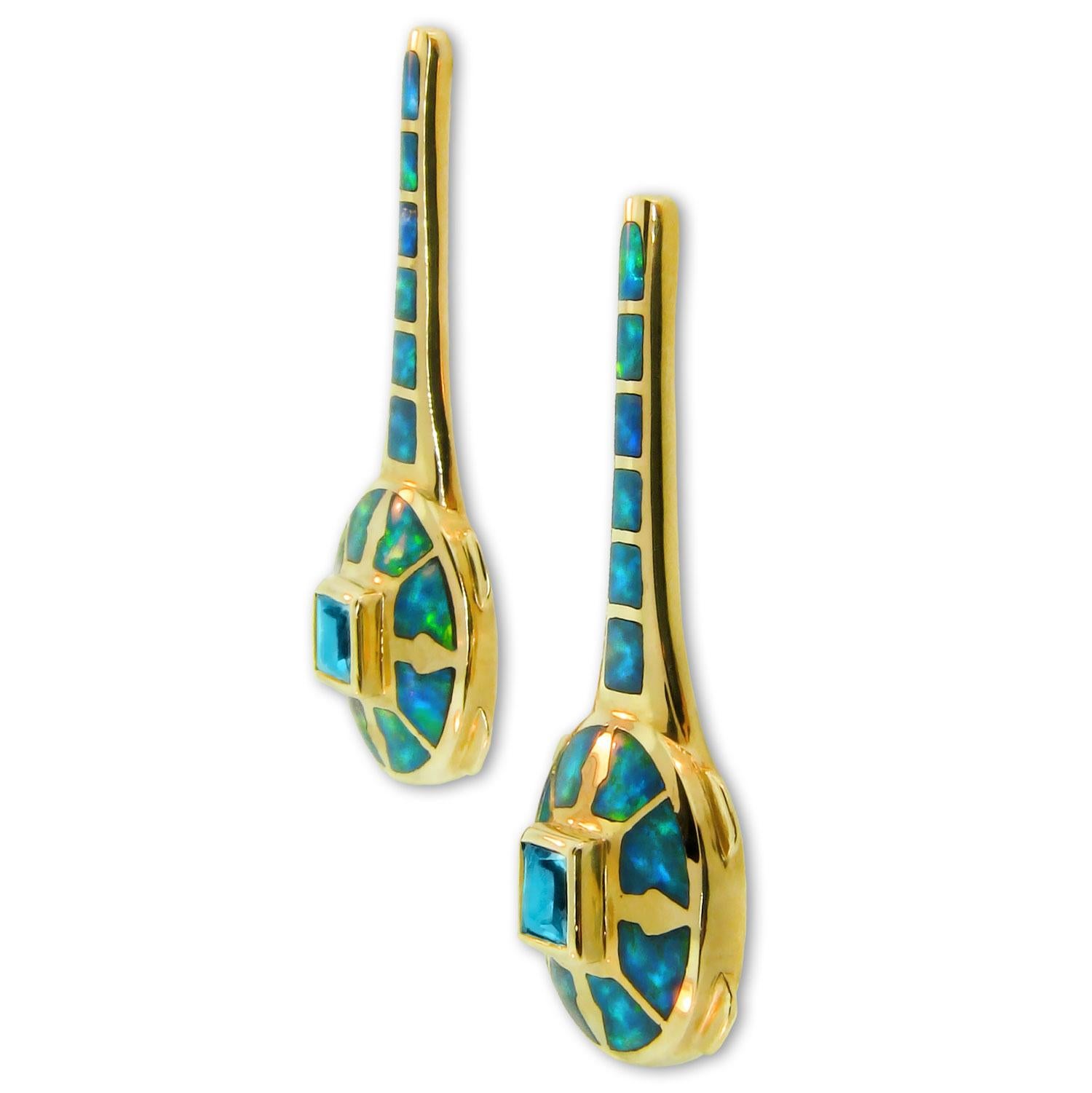 Astonishing Australian Opal Earrings, created by International award-winning jewelry designer Jonathan Duran. These earrings, structured in 14 karat yellow gold feature a princess cut Blue Topaz, 1.00 carat total as the focal point. The Blue Topaz