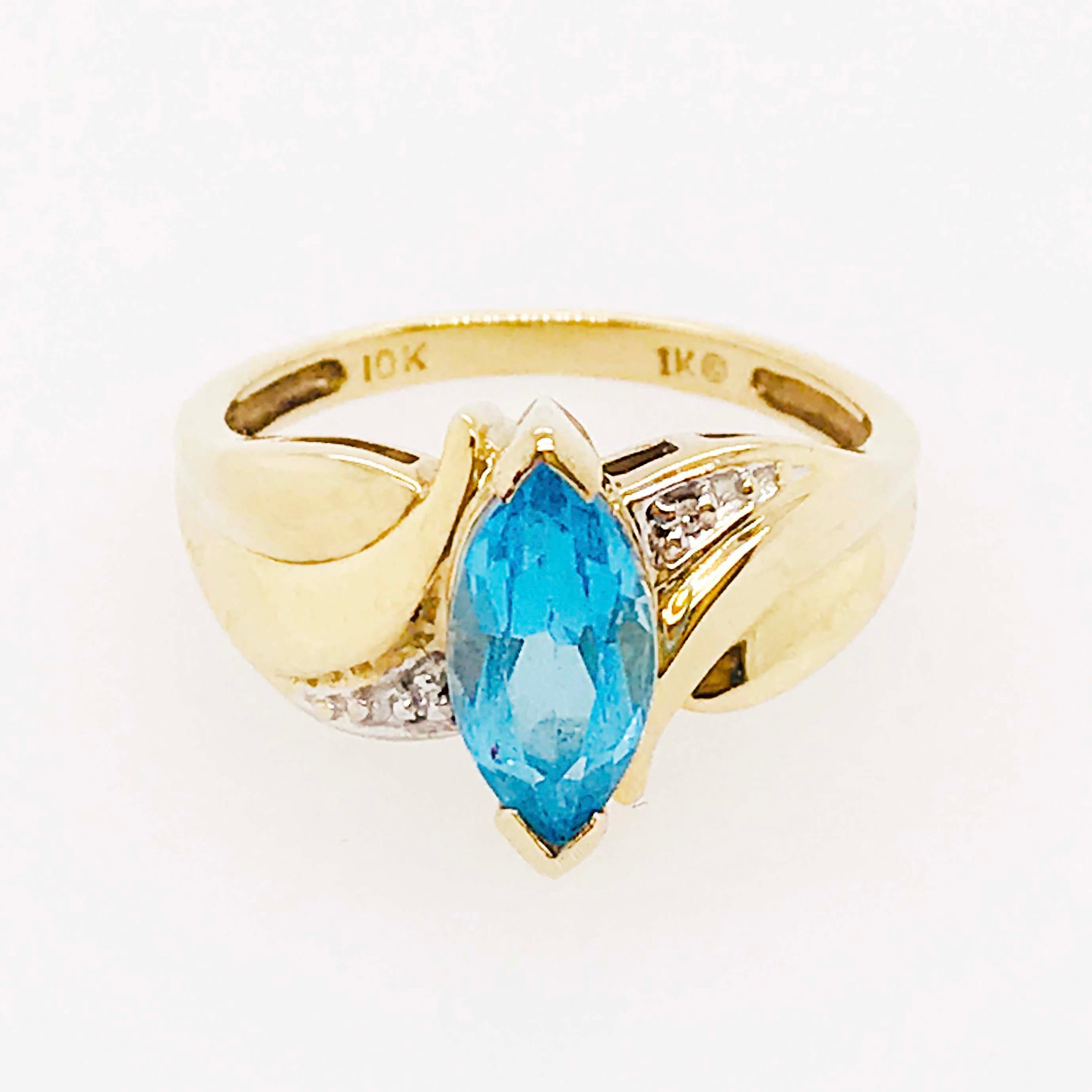 The gorgeous blue topaz and diamond ring has a lovely setting matched with a beautiful blue topaz. The center gemstone is a genuine blue topaz gemstone, cut in a marquise shape. The marquise shape displays the natural blue colors in the topaz