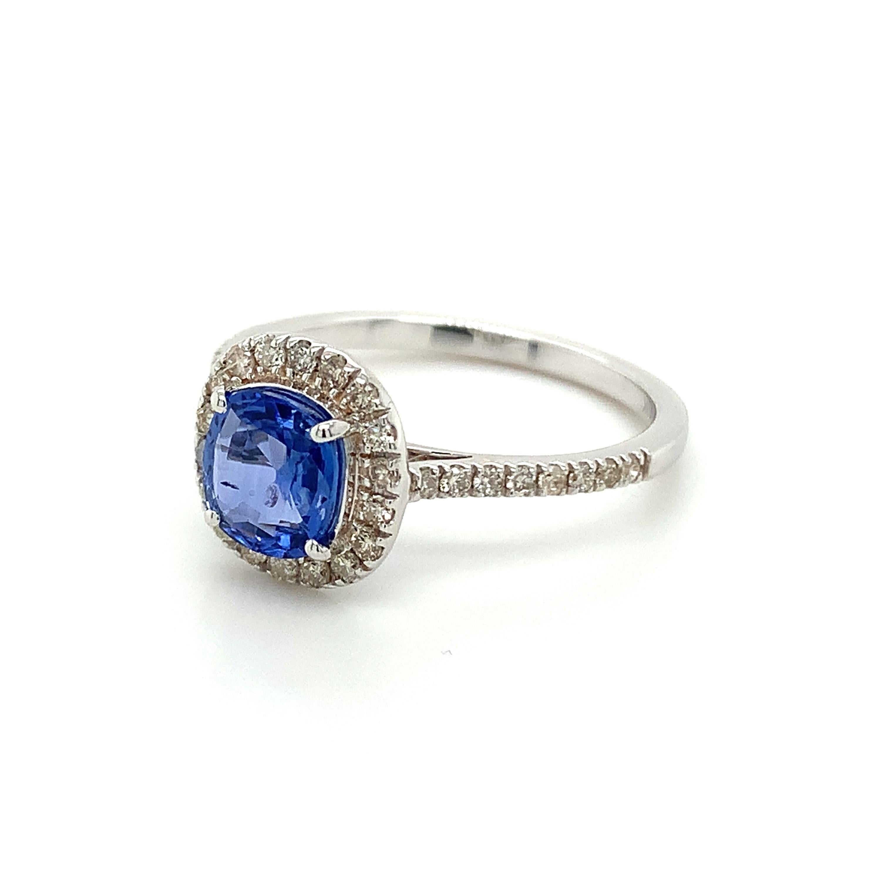 Cushion cut blue sapphire gemstone beautifully crafted in a 10K white gold ring with natural diamonds.

A highly precious September birthstone with a delighting blue color. They are believed to bring good luck & fortune in life. Explore a vast range