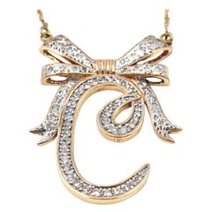 1.00 Carat Diamond 14 Karat Rose Gold “C” Bow Pendant Necklace