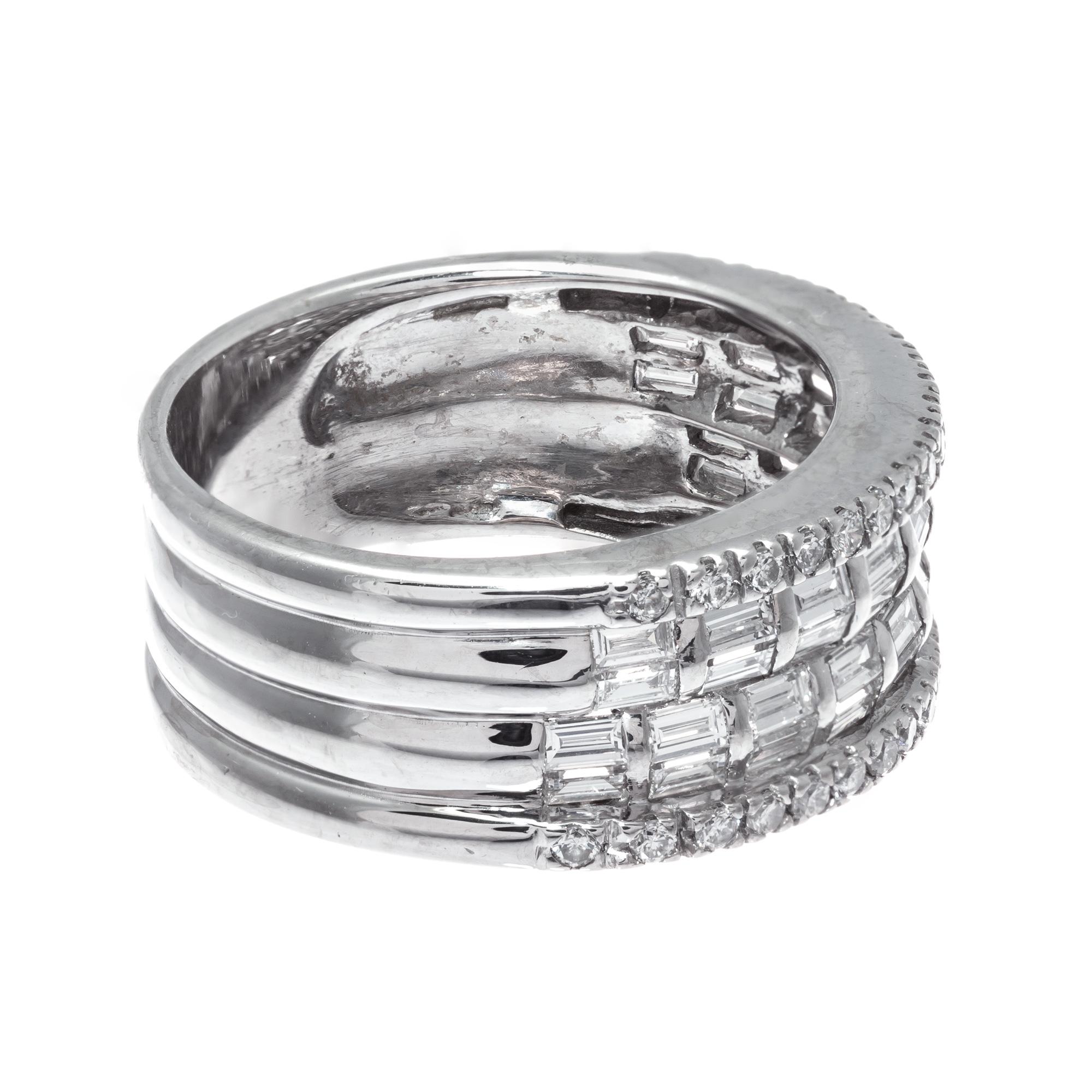 9mm wide four row baguette and round diamond band with bright white sparkly diamonds, in a 18k white gold setting. 

40 baguette cut G VS diamonds Approx. Total Weight 0.75cts.
38 round brilliant cut GH VS diamonds  Approx. Total Weight 0.25cts
Size