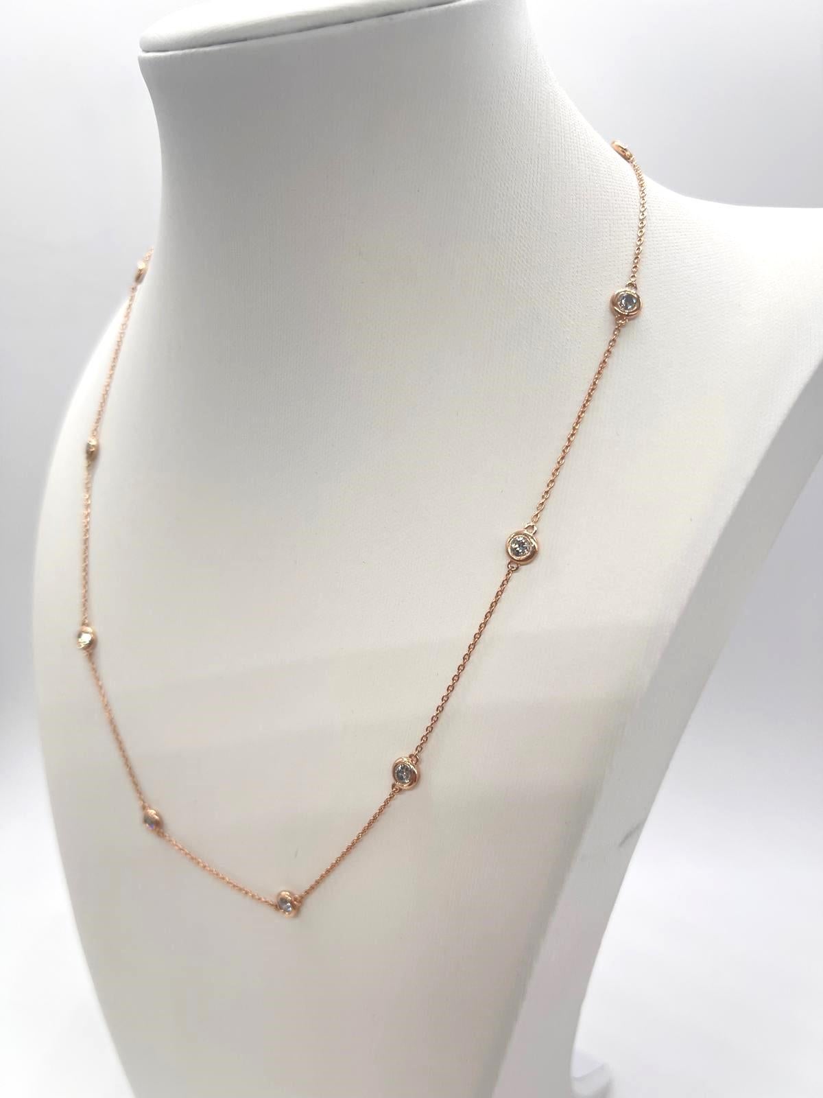 10 Station Diamond by the yard necklace set in Italian made 14K rose gold. 
Total weight is 1.00 carats. Beautiful shiny stones. 
Length 18 inch 4.15 grams. Average F-I Natural Diamond

*Free shipping within U.S*