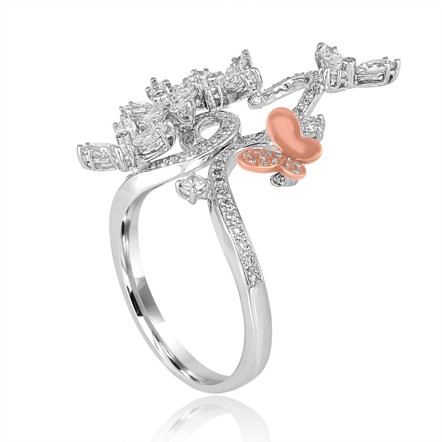 Very Unusual Flower Branch Ring
The ring is 18K White & Rose Gold
There are 1.00 Carats in Diamonds F/G SI
The ring is a size 7.75, sizable
The ring measures 1.25