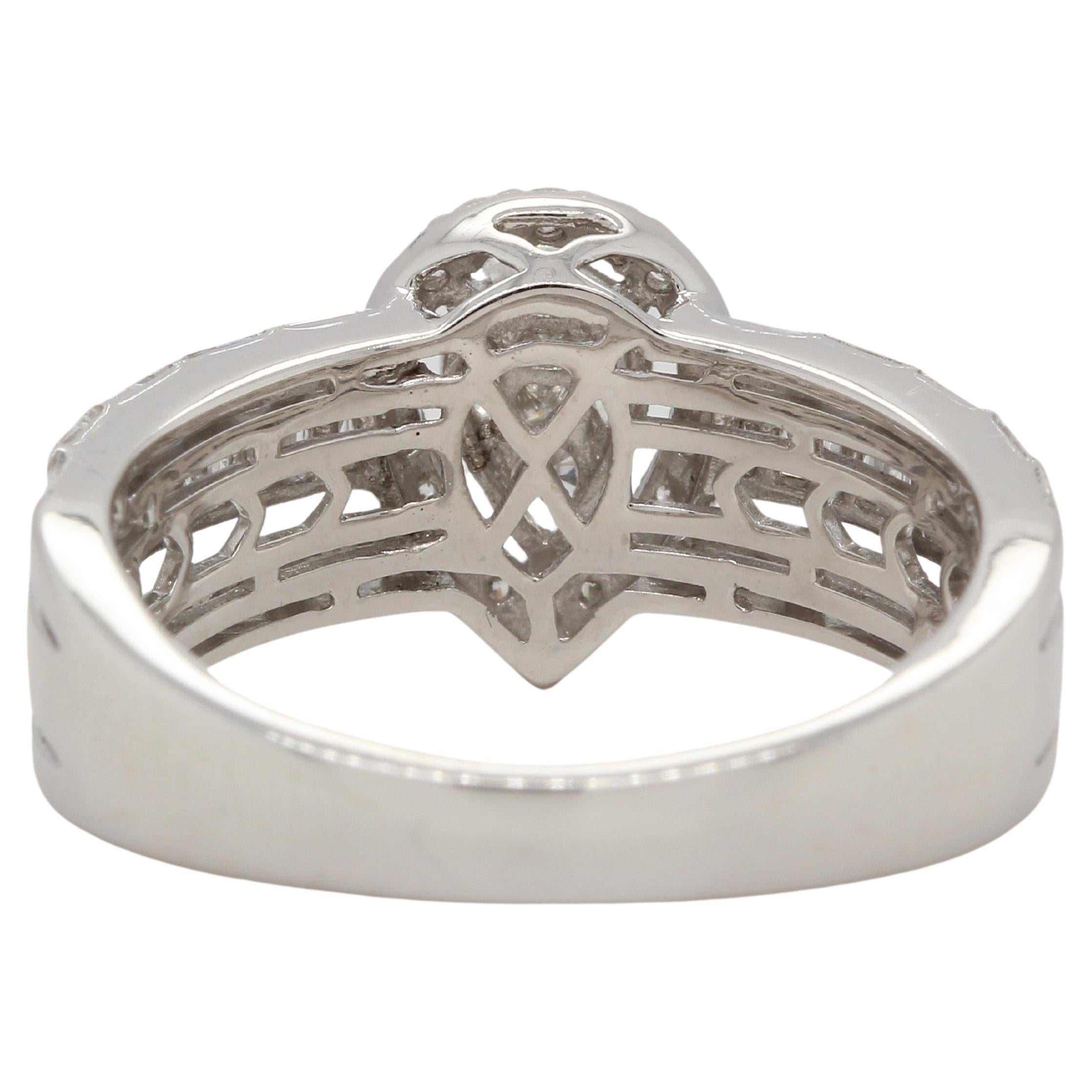 This intricate wedding band from Illusion features a stunning array of white diamonds with 1.00 carat of diamonds. The ring is set with diamond round 0.15 carat, diamond marquise 0.11 carat, diamond tapper 0.62 carat, diamond pear .08 carat and