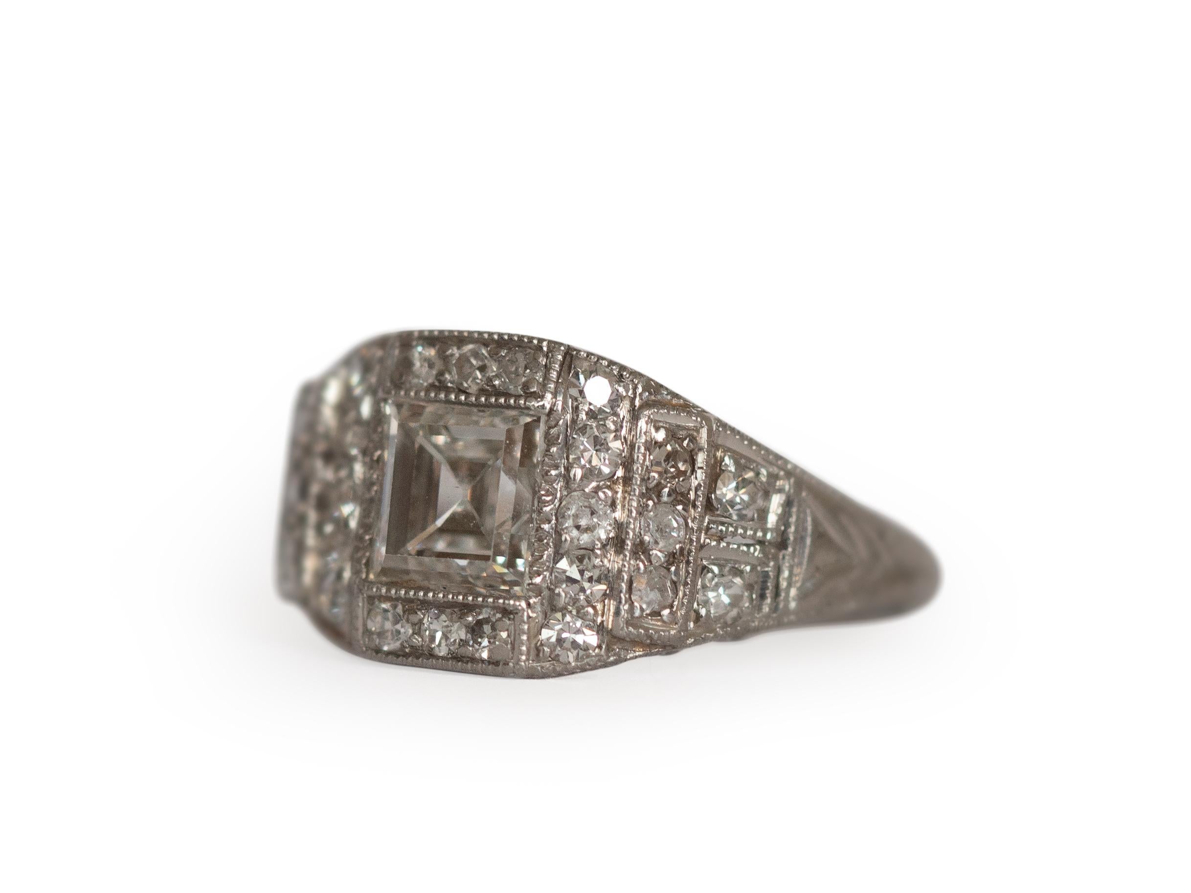 Item Details: 
Ring Size: 4
Metal Type: Platinum [Hallmarked, and Tested]
Weight: 3.1 grams

Center Diamond Details:
Weight: 1.00 Carat
Cut: Antique Carre Cut
Color: E/F
Clarity: VS1

Side Diamond Details:
Weight: .25 Carat Total Weight
Cut: Antique