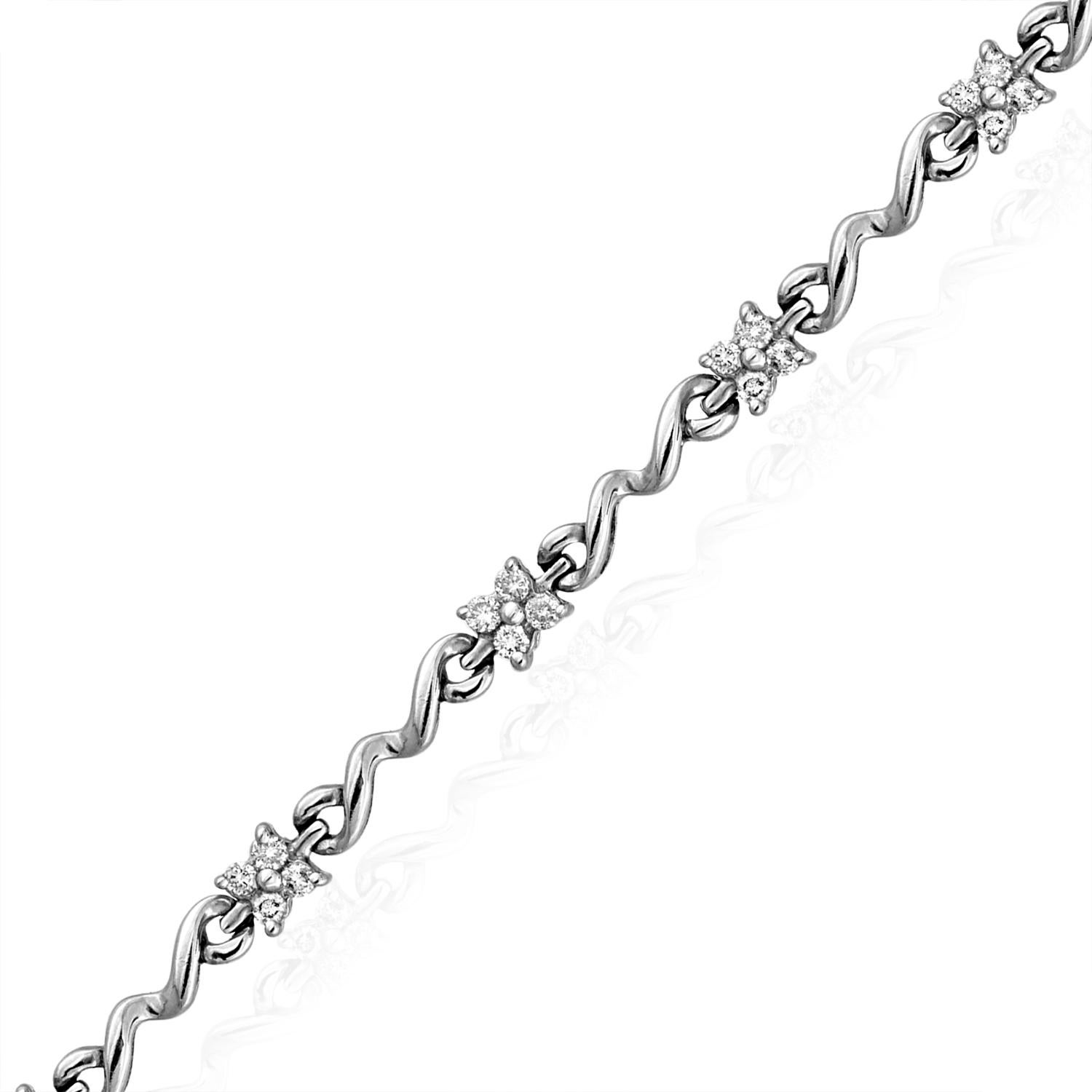 Beautifully Simple Flower Cluster Bracelet 
The bracelet is Platinum 950
It has 1.00 Carats in Diamonds G SI
The bracelet is 7.25