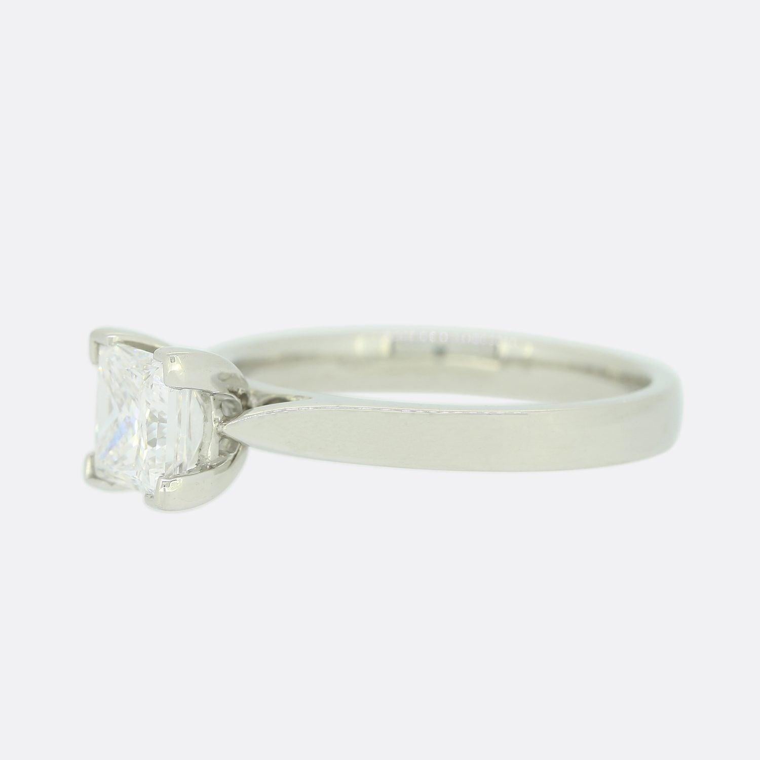 This is a platinum, diamond solitaire ring. The focal point of this engagement ring is a beautiful princess cut 1.0 carat diamond.

Condition: Used (Excellent)
Weight: 5.0 grams
Size: L
Diamond Details: 1.0 Carats, Colour: D, Clarity: VVS1
Band