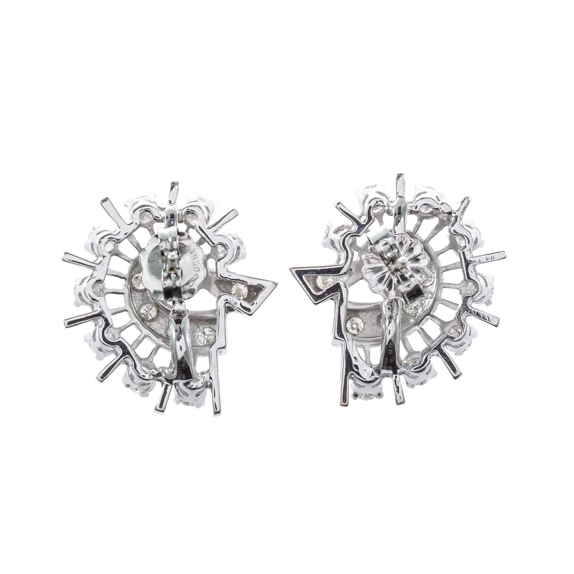 Celestial comet design spray earrings circa 1865 set with 28 round brilliant cut diamonds in 14k white gold.  

28 round brilliant cut I SI diamonds, Approximate 1.0 total carat weight 
14k white gold 
Stamped: 585
Top to bottom: 18.8mm or ¾