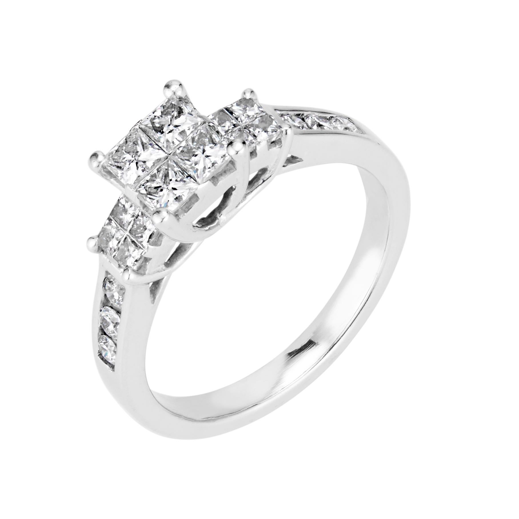 Invisible set princess cut engagement ring.  The princess cut diamonds are set in three groups of four diamonds each to give the look of a one carat center and .25 carat look on each side in 14k white gold setting.

12 princess cut diamonds, H-I SI