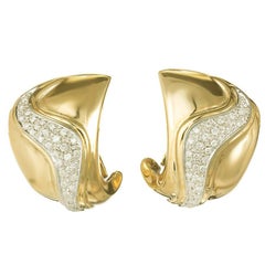 Boucles d'oreilles à pince en or jaune avec diamant de 1,00 carat et tourbillon