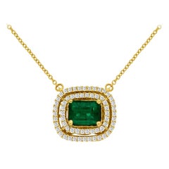 1.00 Carat Emerald and Diamond Pendant Set "East West" in 14 Karat Yellow Gold