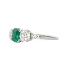Anello di fidanzamento in platino con smeraldo e diamante da 1,00 carati