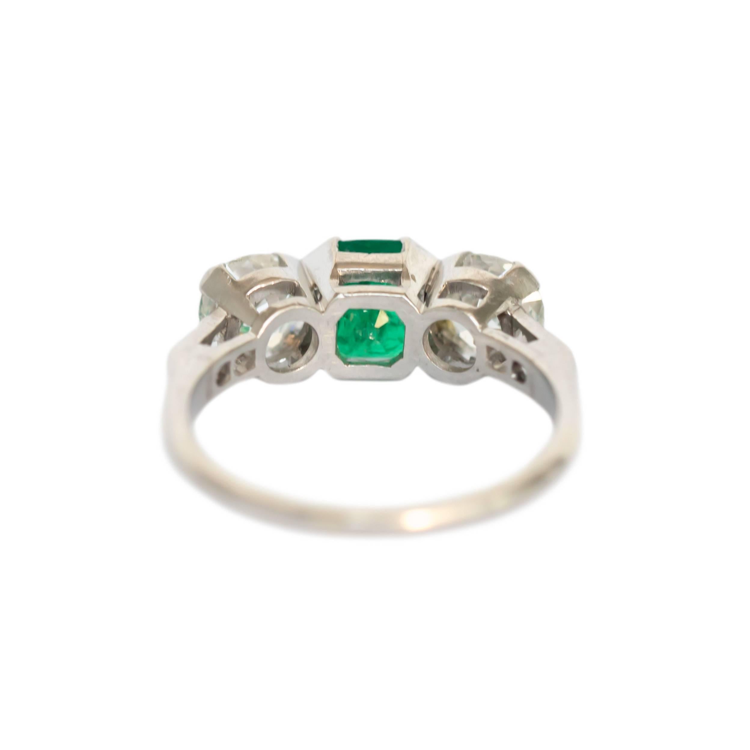 1.00 Carat Emerald and Diamond Platinum Engagement Ring In Excellent Condition For Sale In Atlanta, GA