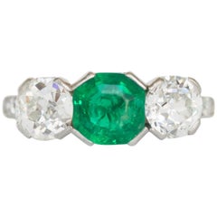 Antique 1.00 Carat Emerald and Diamond Platinum Engagement Ring