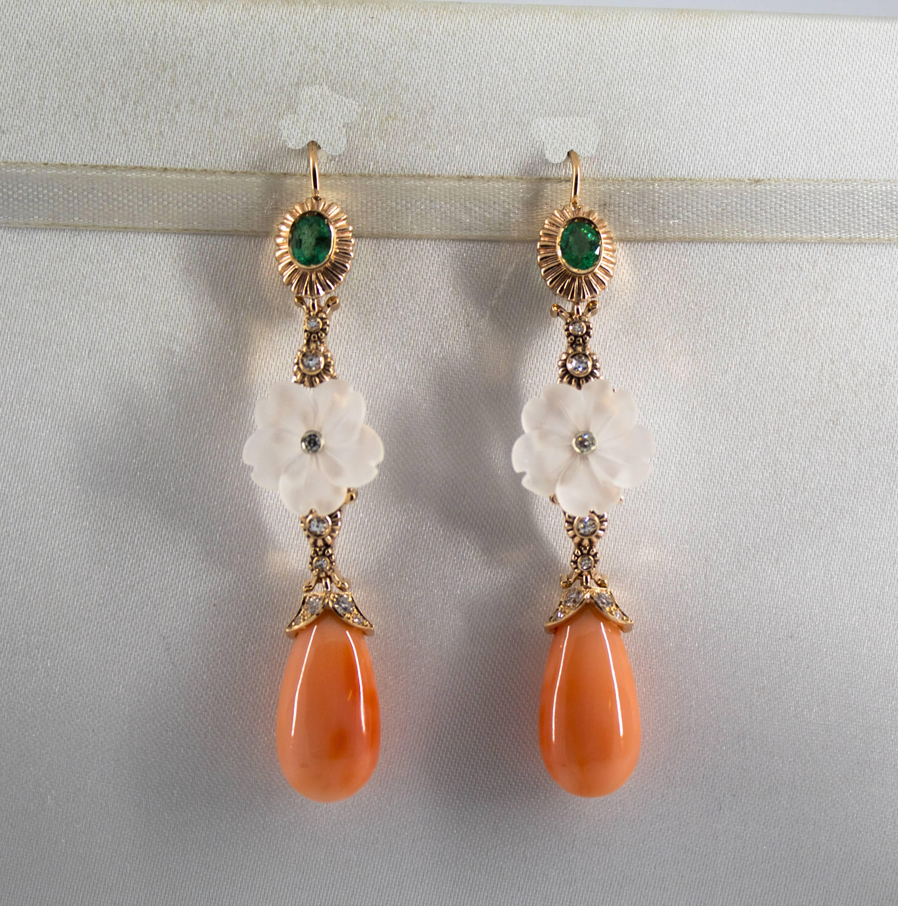 These Stud Earrings are made of 14K Yellow Gold.
These Earrings have 0.35 Carats of White Diamonds.
These Earrings have 1.00 Carats of Emeralds.
These Earrings have also Coral and Rock Crystal.
All our Earrings have pins for pierced ears but we can
