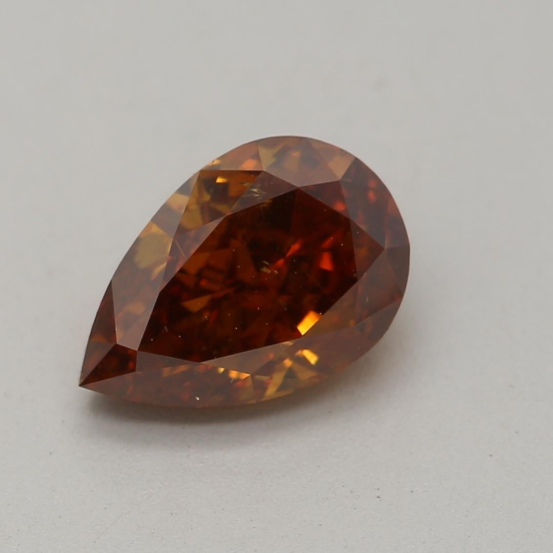 *100% NATURAL FANCY COLOUR DIAMOND*

✪ Diamond Details ✪

➛ Shape: pear
➛ Colour Grade: Fancy Deep Brown Orange
➛ Carat: 1.00
➛ Clarity: I1
➛ GIA Certified 

^FEATURES OF THE DIAMOND^

This 1 carat diamond refers to the weight of the diamond, not
