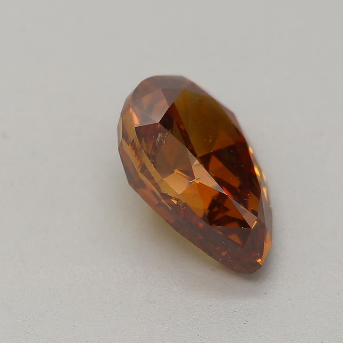 Women's or Men's 1.00 Carat Fancy Deep Brown Orange Pear cut diamond i1 Clarity GIA Certified For Sale