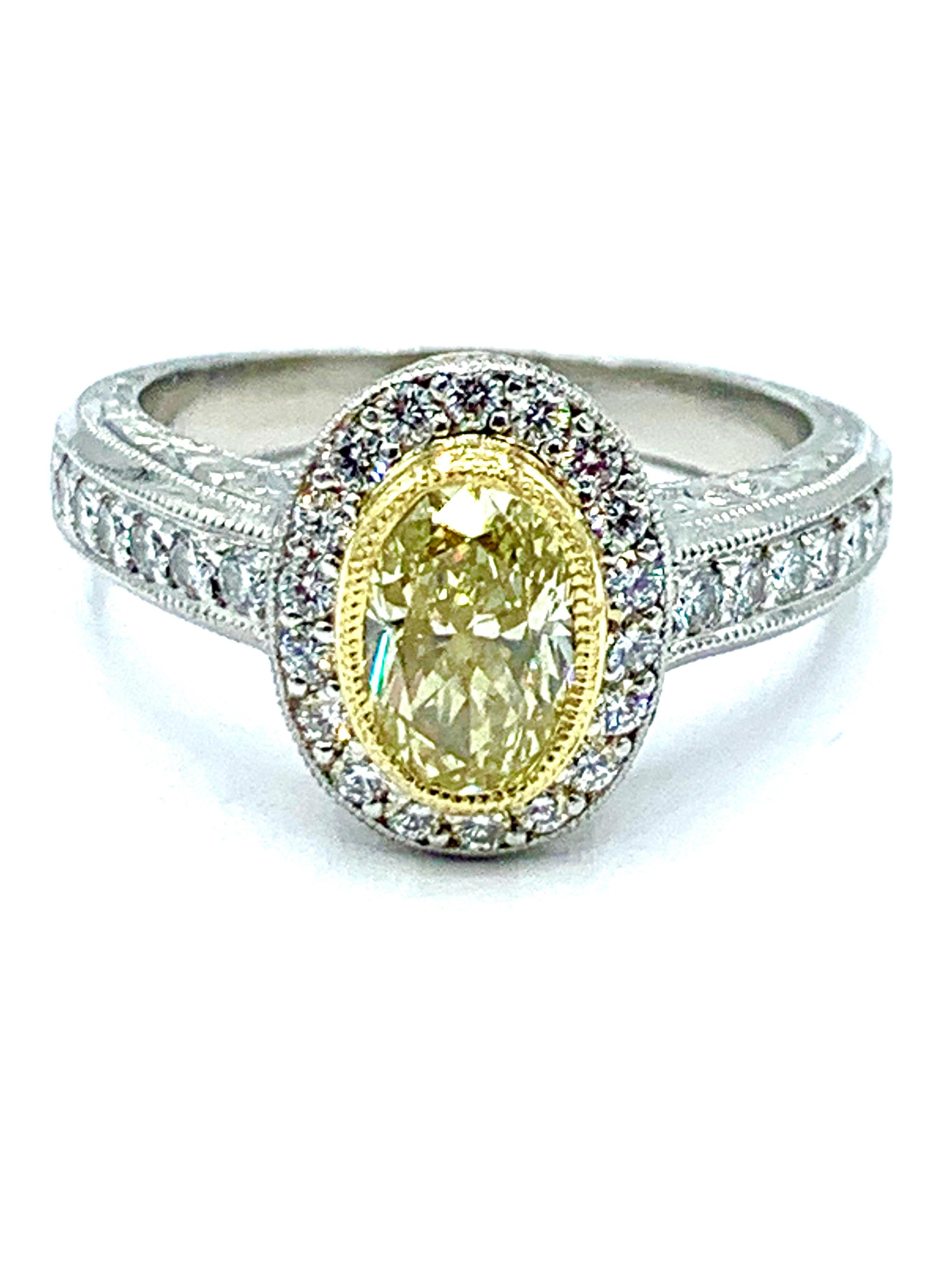 Art Deco 1.00 Carat Fancy Yellow Oval Diamond Platinum and Yellow Gold Engagement Ring