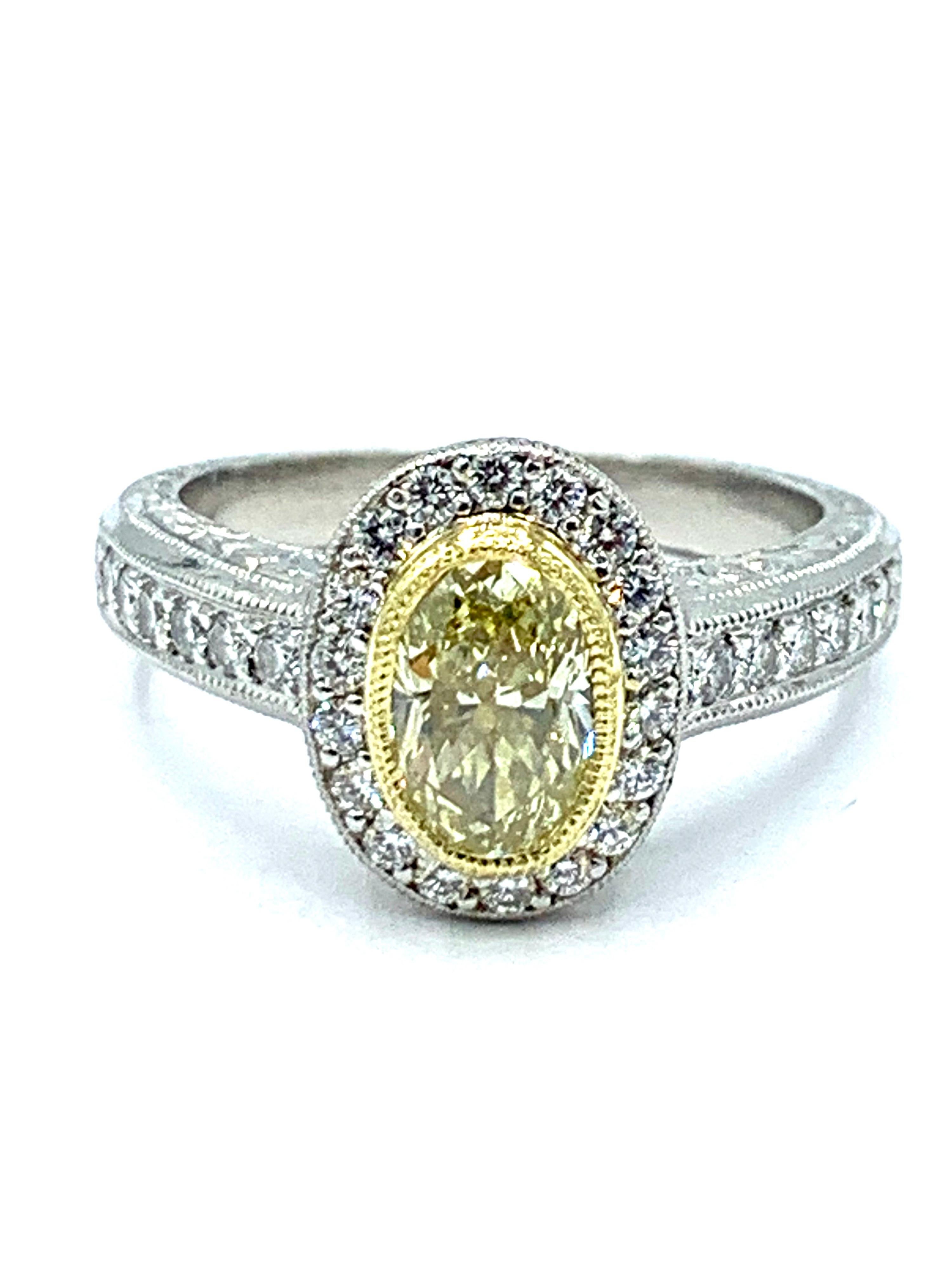 Oval Cut 1.00 Carat Fancy Yellow Oval Diamond Platinum and Yellow Gold Engagement Ring