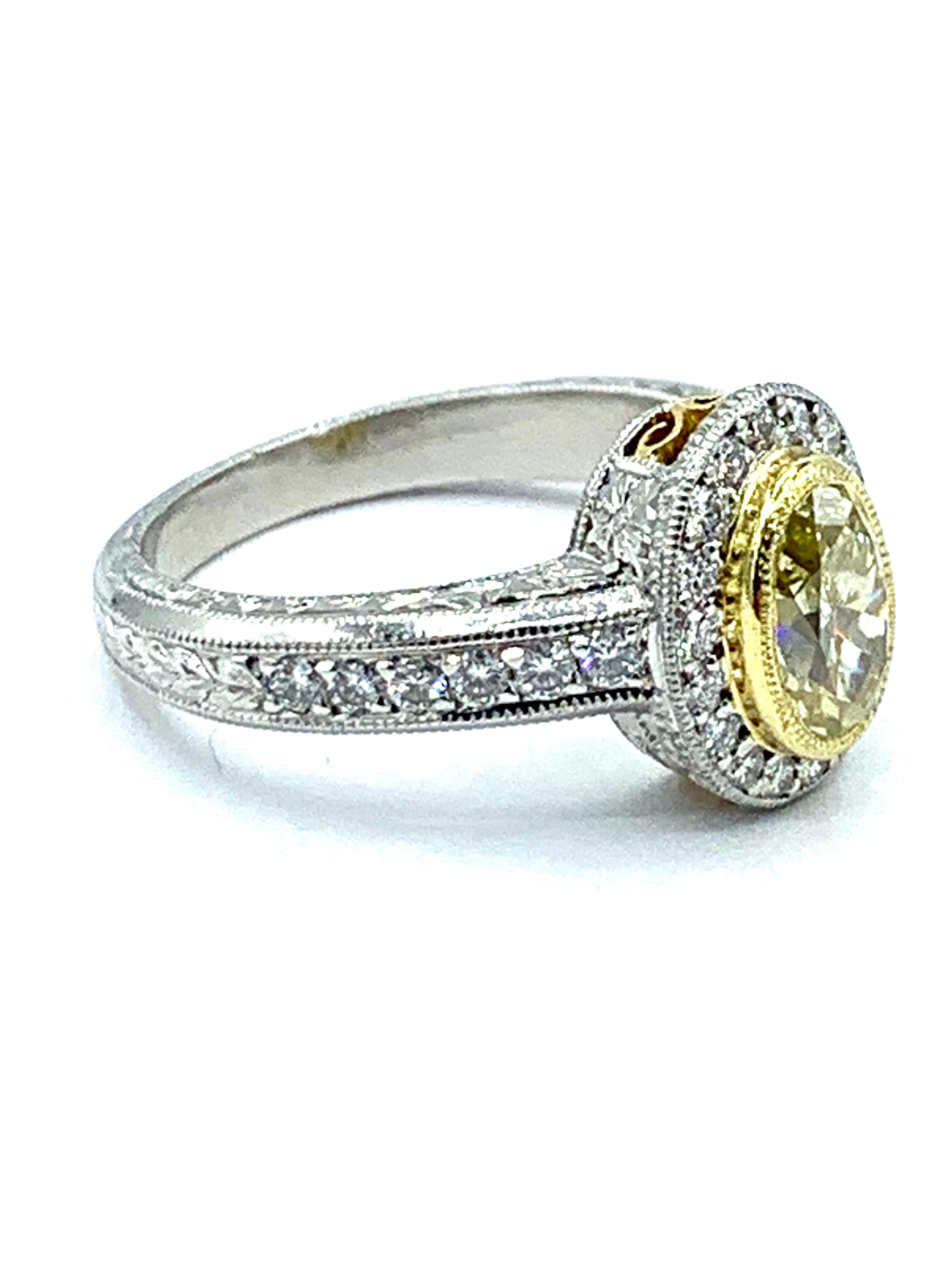 1.00 Carat Fancy Yellow Oval Diamond Platinum and Yellow Gold Engagement Ring In New Condition In Chevy Chase, MD