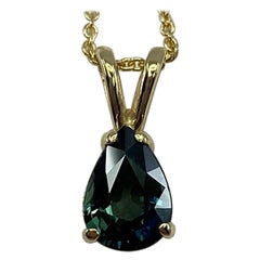 Colgante de oro amarillo con zafiro azul verde fino de 1,00 quilates talla lágrima de pera