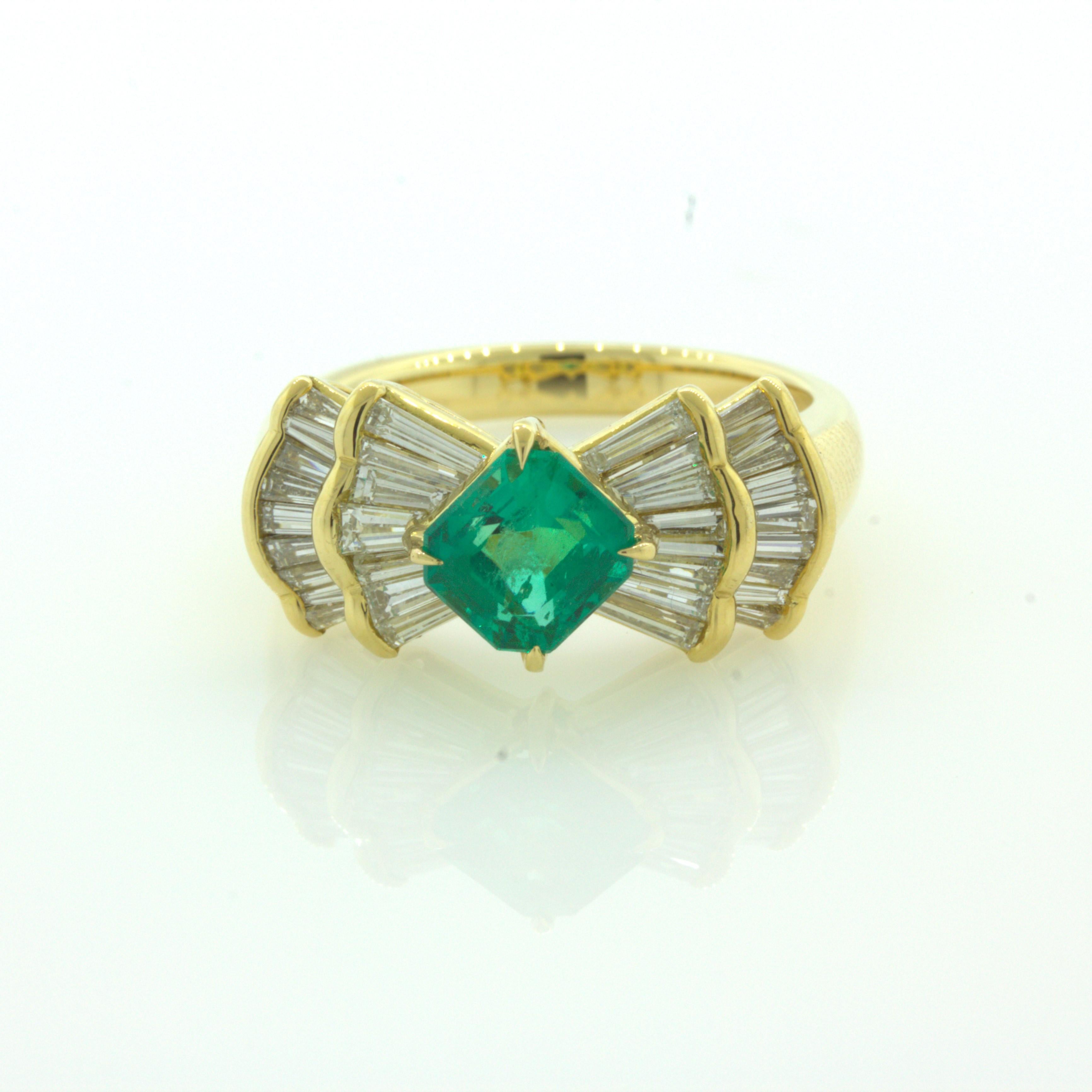 A lovely yellow gold ring featuring a very fine emerald weighing 1.00 carat exactly. What makes this stone very fine is its bright and vivid green color, as if you were looking into a pure green glass. Adding to that, the emerald has a classic