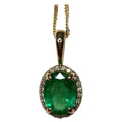 1.00 Carat Green Emerald & Diamond 18 Karat Gold Oval Cut Halo Pendant Necklace