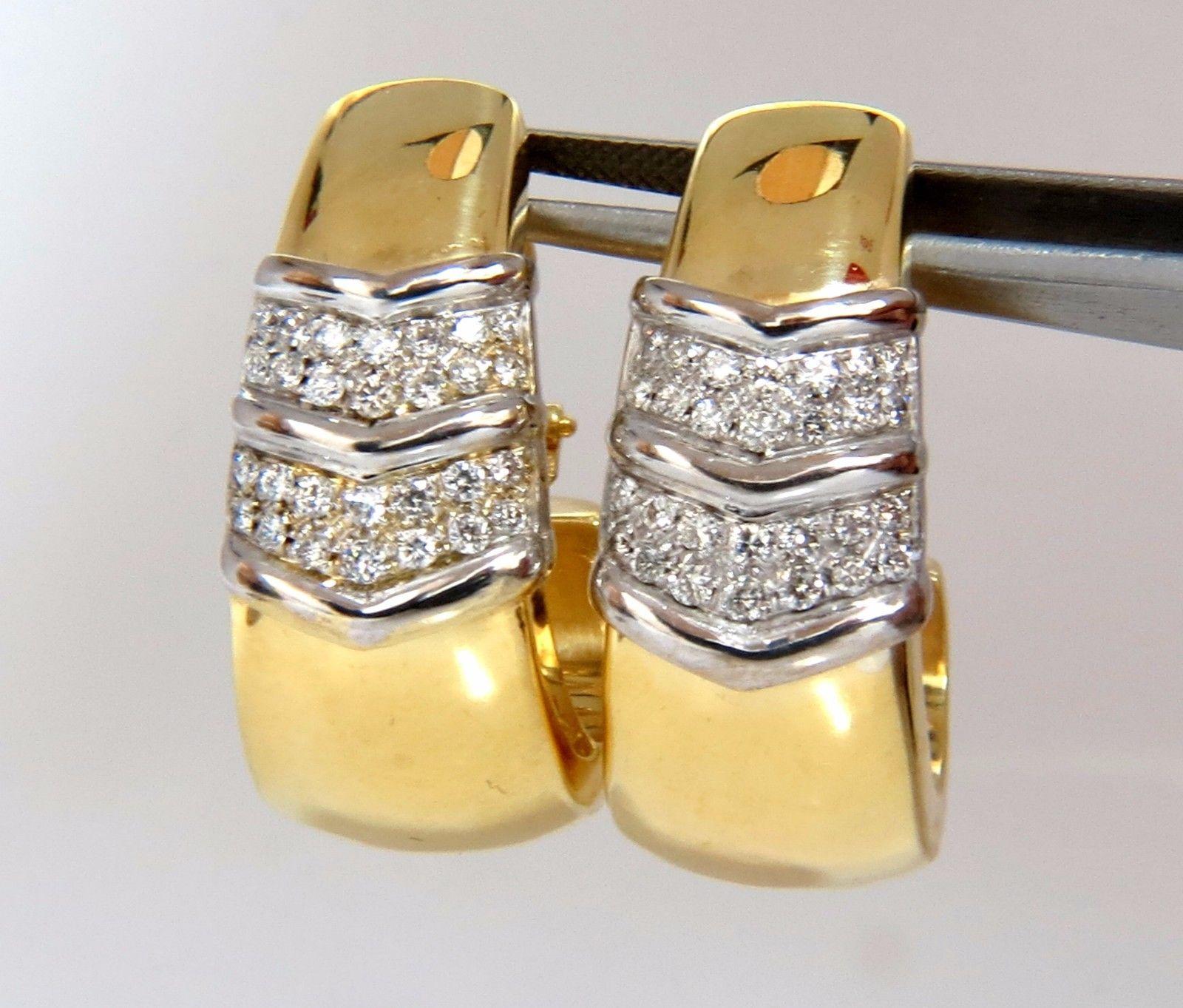 Diamond Semi Hoop / Larger Huggie

Earring Clips

1.00ct. Natural Diamonds: 
Rounds, full cuts

G-color, Vs-2 clarity

23.5 grams

18Kt. yellow gold.

Overall:

 1.37 inch long

.56 inch wide - lower base


Comfortable omega clip

Designer stamp on