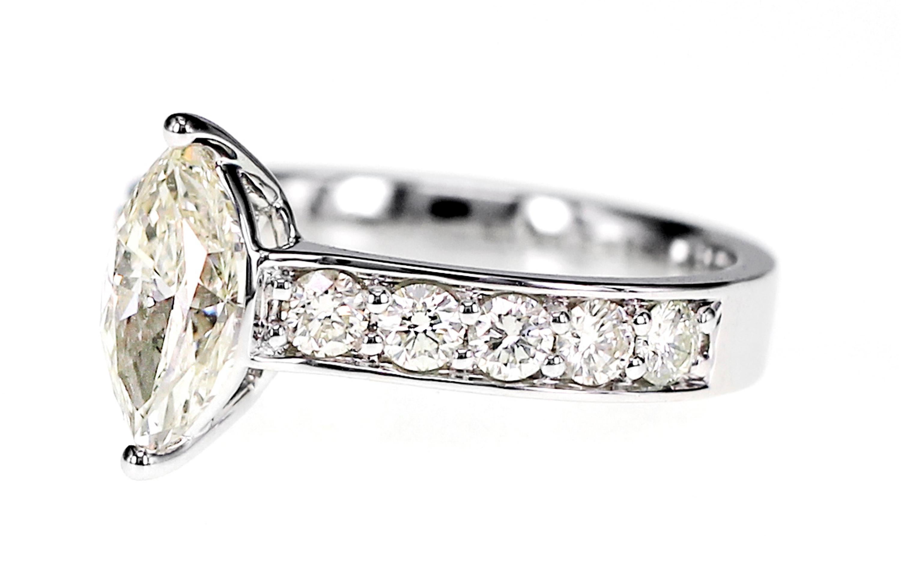 A One carat marquise shaped diamond is put on a classic band ring. 
Approximate Color: J
Approximate Clarity: VS 
Ring Size: US Size 6