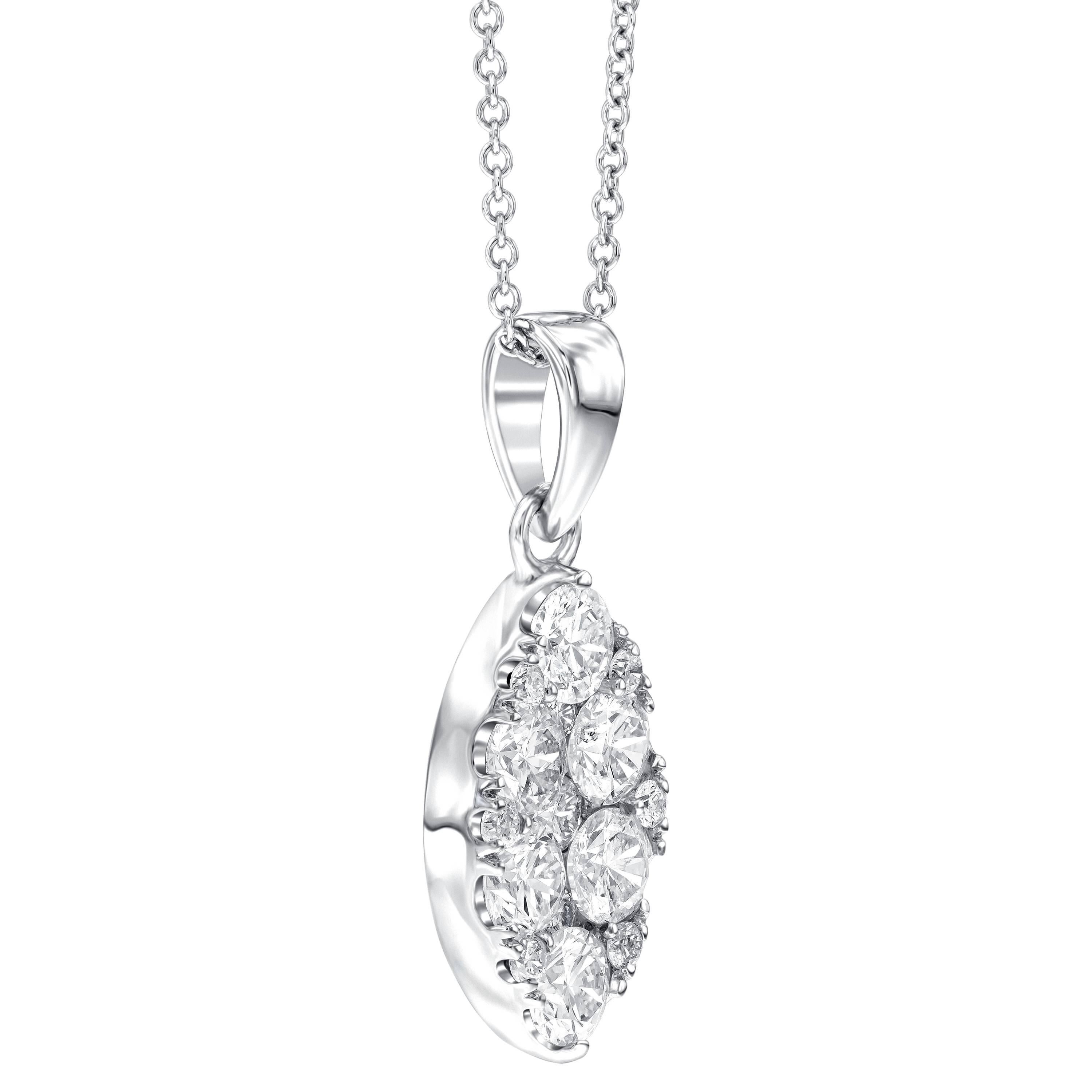 A gorgeous 1.00ct claw set Marquise shaped pendant, inlaid with various size Diamonds this pendant has a unique studded finish that really captures the light. Set in 18ct White Gold which enhances the brilliance of the H-SI white diamonds. This