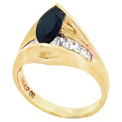 1.00 Carat Marquise Sapphire Ring with Baguette Diamonds in 14K Yellow Gold